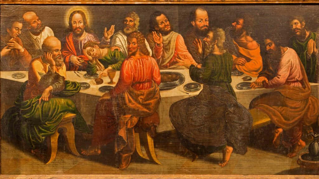 Jesus Disciples 桌布 壁紙 — 一幅戲劇性的文藝復興繪畫描繪耶穌和他的門徒在最後的晚餐期間圍坐在一張長桌旁，帶有富有表現力的手勢和豐富的大地色調。