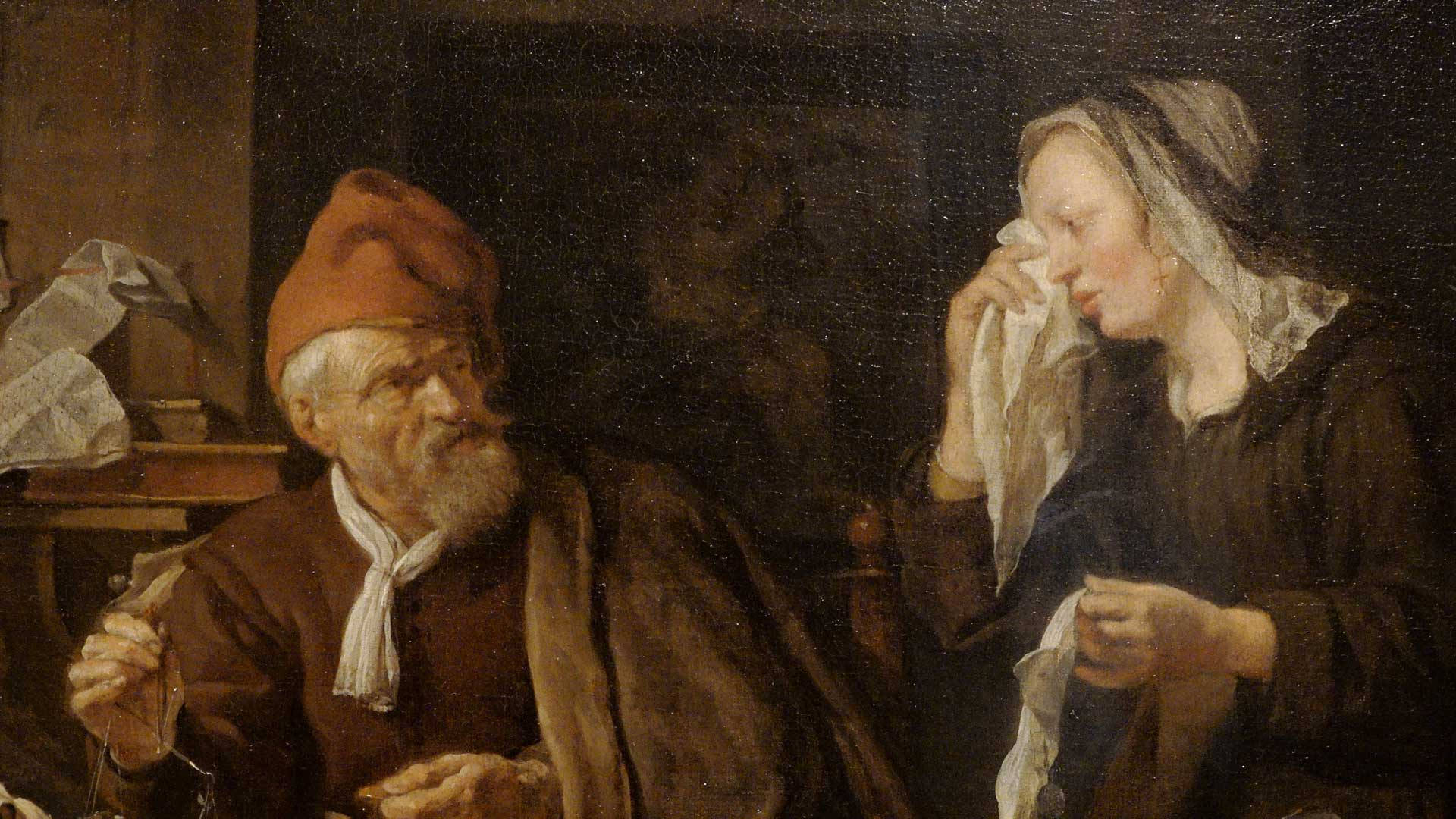 Rembrandt 桌布 壁紙 — 一幅油畫描繪了一位戴紅帽的老人和一位戴頭巾的女人在昏暗的室內用布擦鼻子。