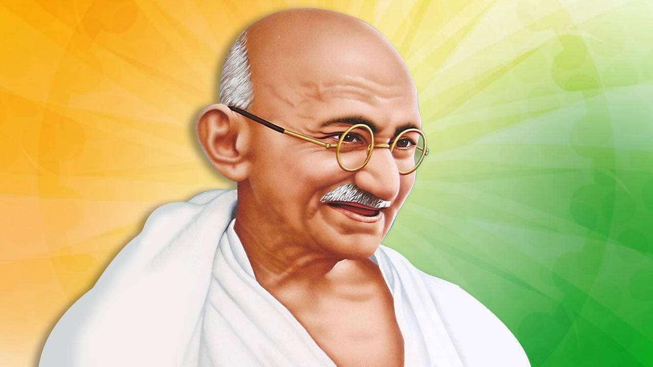 Mahatma Gandhi 桌布 壁紙 — 一幅燦爛的肖像，聖雄甘地面對充滿活力的黃色和綠色漸變背景溫暖微笑。