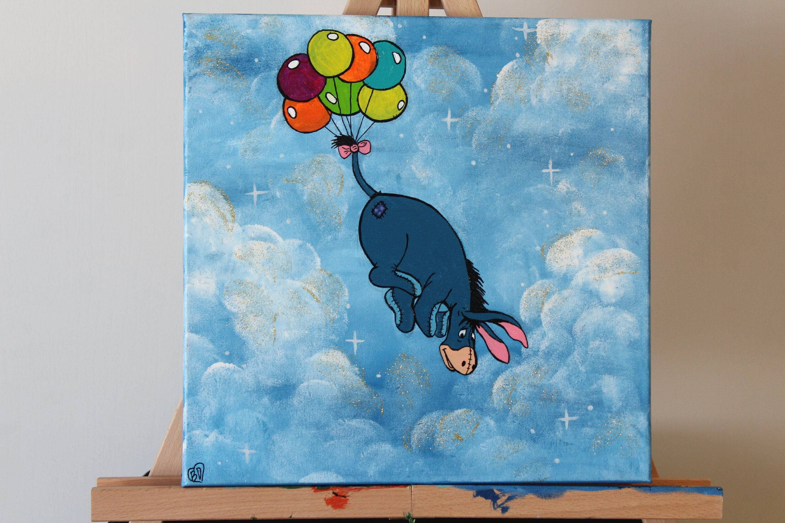 Eeyore 桌布 壁紙 — 一幅異想天開的畫作，描繪屹耳倒掛在繁星點點的藍色雲層中，被一串彩色氣球牽引著。