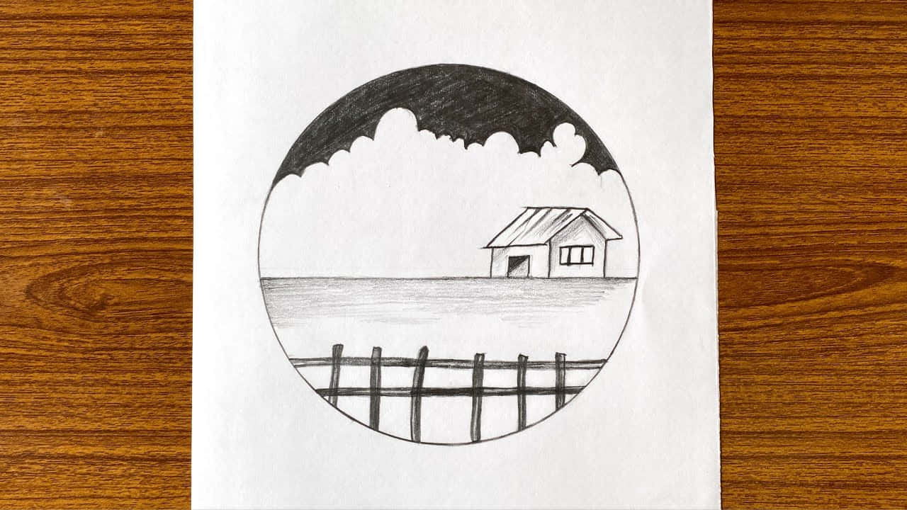 draw 桌布 壁紙 — 一幅簡單的鉛筆畫，描繪一間孤獨的房子在陰天天空下，框在一個圓圈內，畫在白色紙上，紙張放在木質表面上。