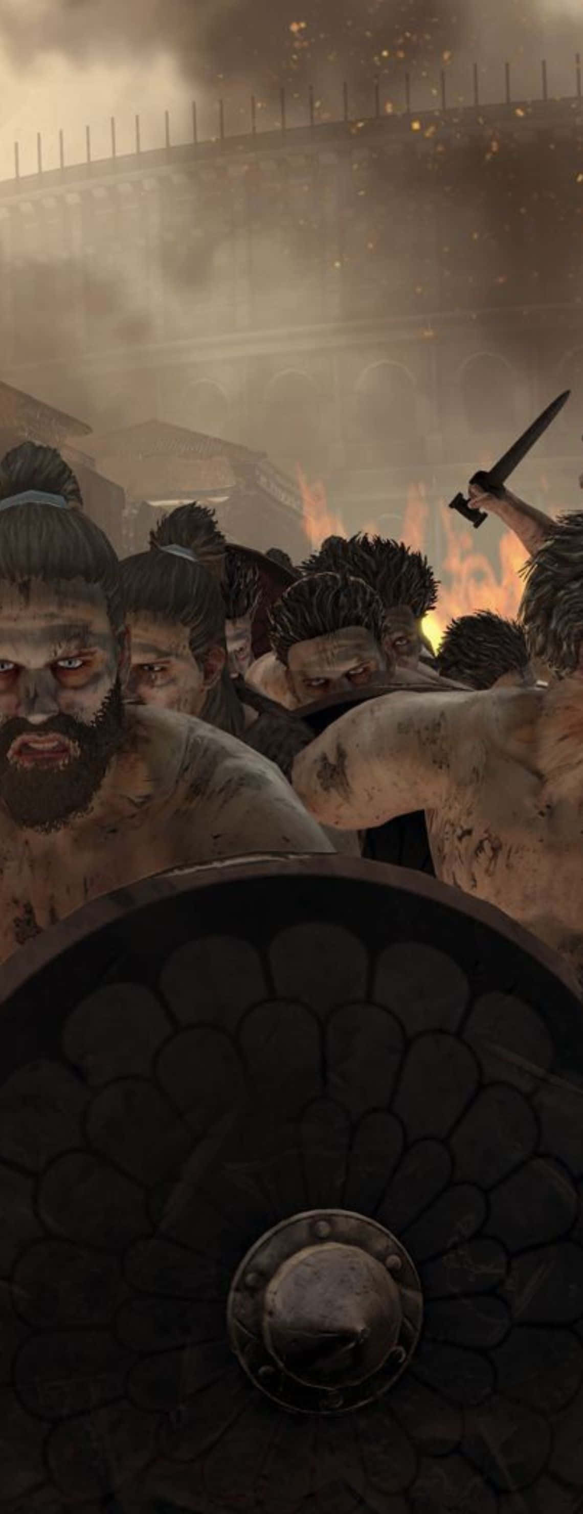 Pixel 3xl Total War Attila 桌布 壁紙 — 一幅粗糙的數位插圖，描繪戰士們在血跡斑斑的角鬥場中，背景有煙霧、火焰，前景有一面巨大的盾牌。