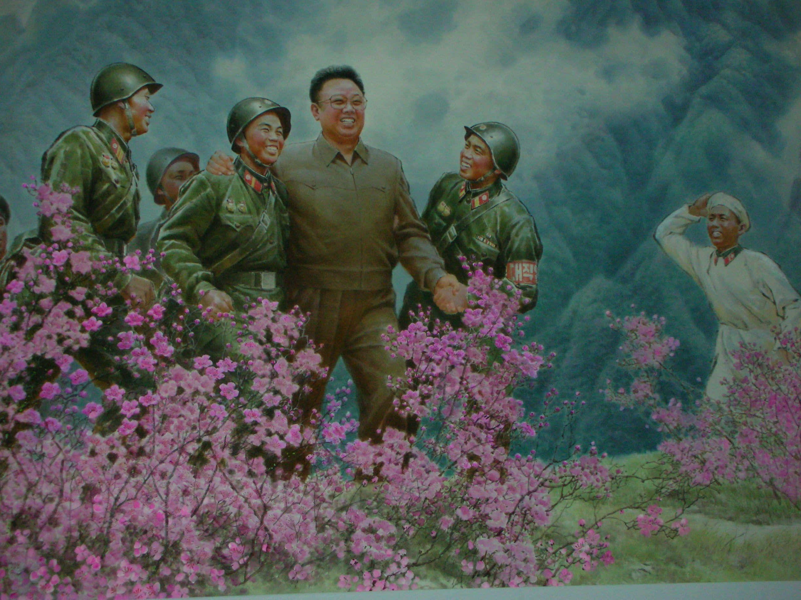 North Korea 桌布 壁紙 — 一幅繪畫場景顯示，一名穿著平民服裝的中心人物在盛開的粉紅色灌木叢中微笑，背景是山脈，周圍有穿著綠色制服的士兵。