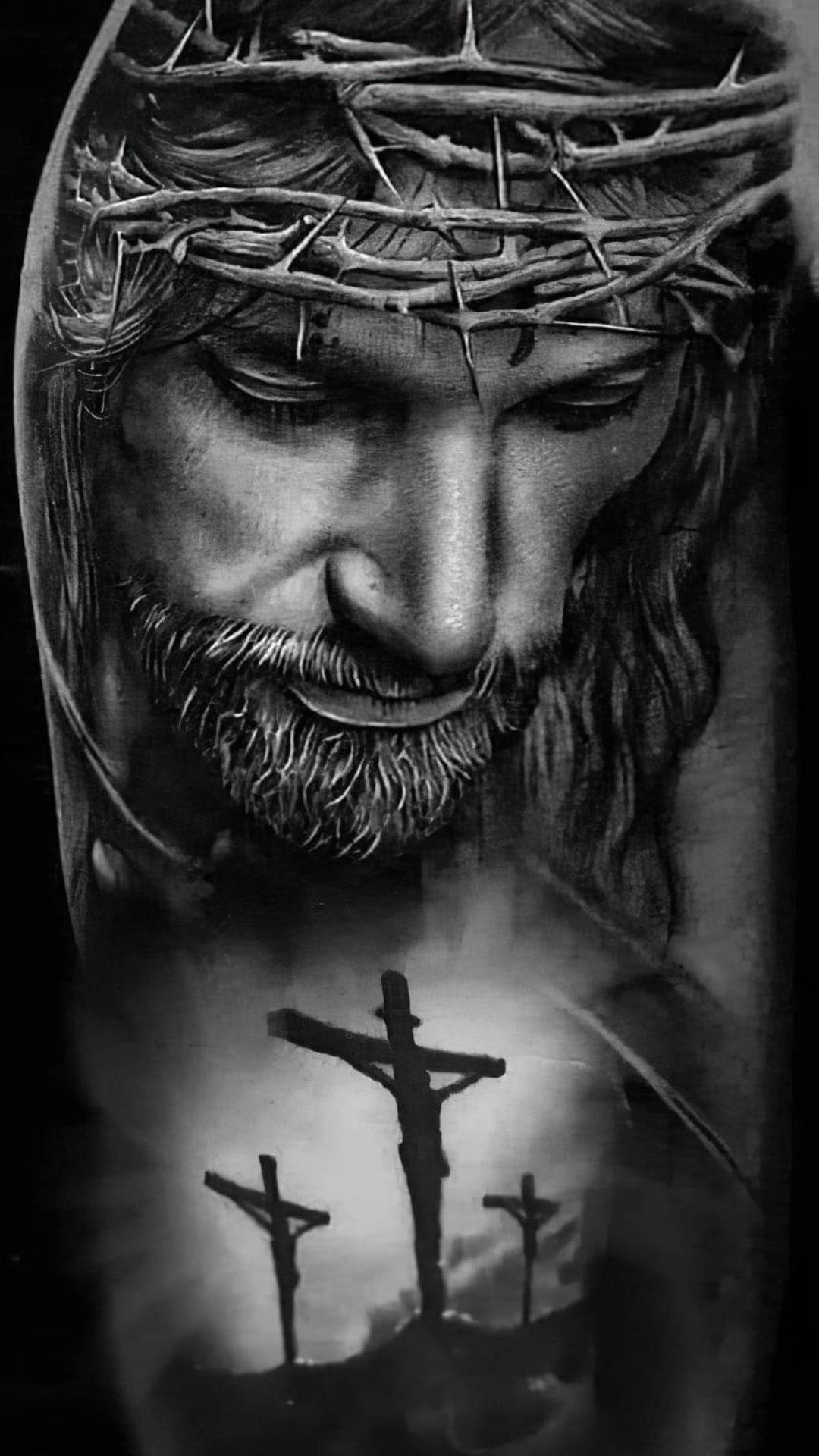 Christ 桌布 壁紙 — 一幅莊嚴的黑白耶穌肖像，頭戴荊棘冠冕，下巴下方刻有三個十字架。