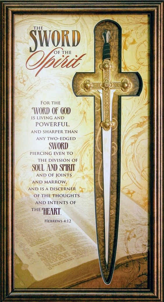 Armor Of God 桌布 壁紙 — 一幅裱框的宗教藝術品，展示一把金色十字架形狀的劍直立在一本打開的聖經上，聖經帶有經文。