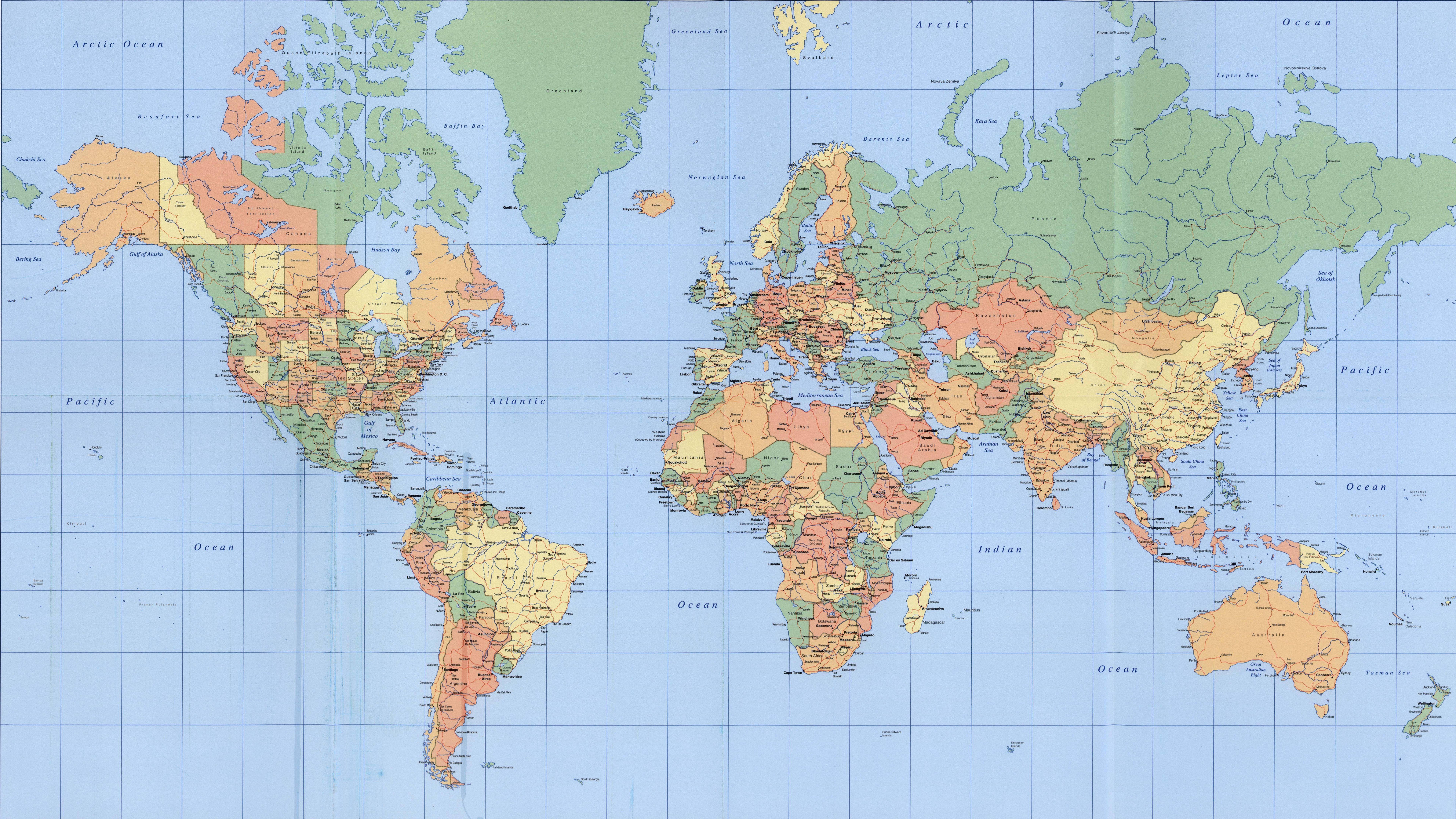世界地圖 桌布 壁紙 — 一幅詳細的政治世界地圖，大陸以多種大地色調呈現，背景為淺藍色海洋網格。