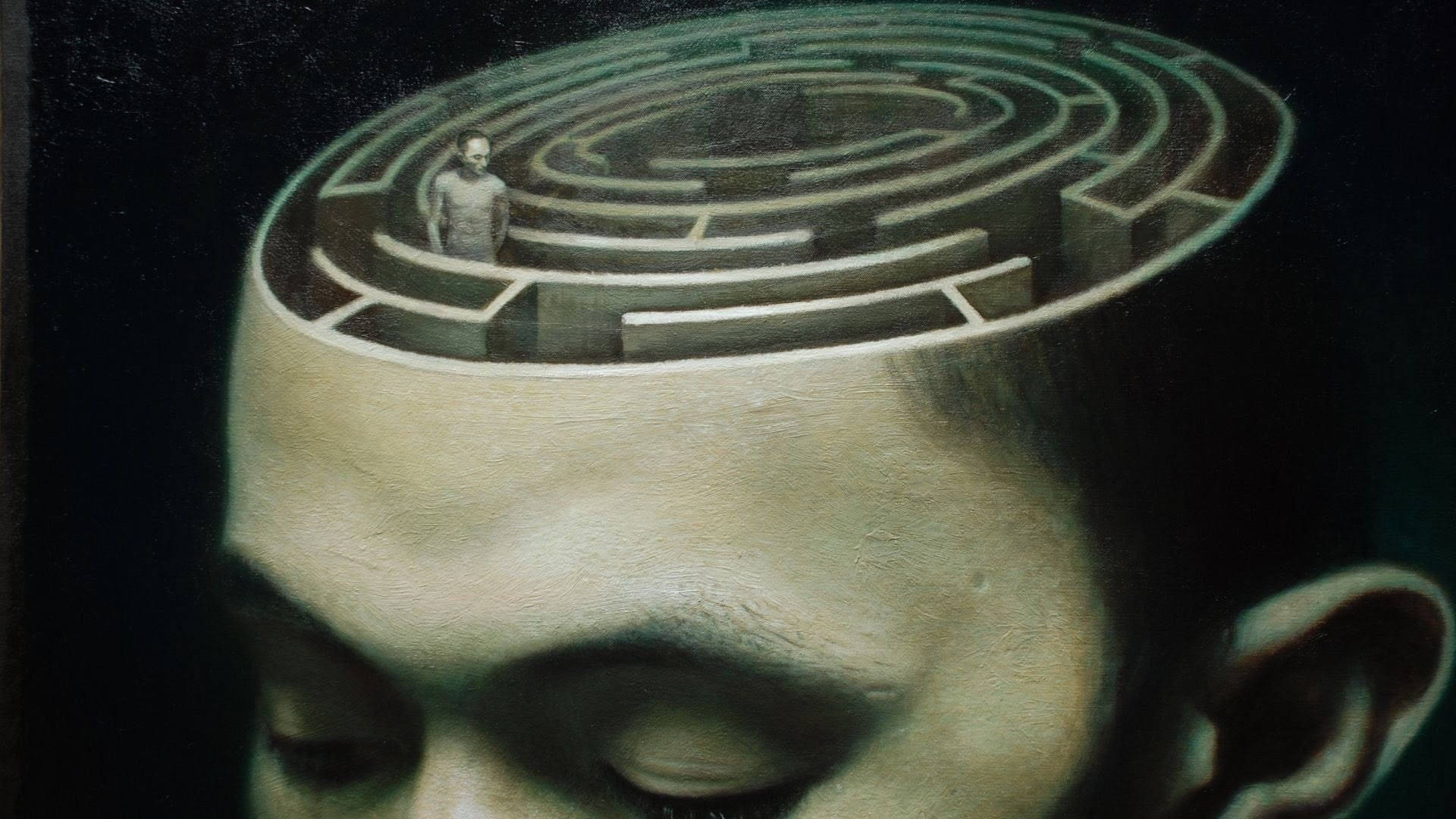 男人頭部的特寫，內部有一個迷宮，象徵內心的想法和困惑。 — 抽象藝術動圖 壁紙