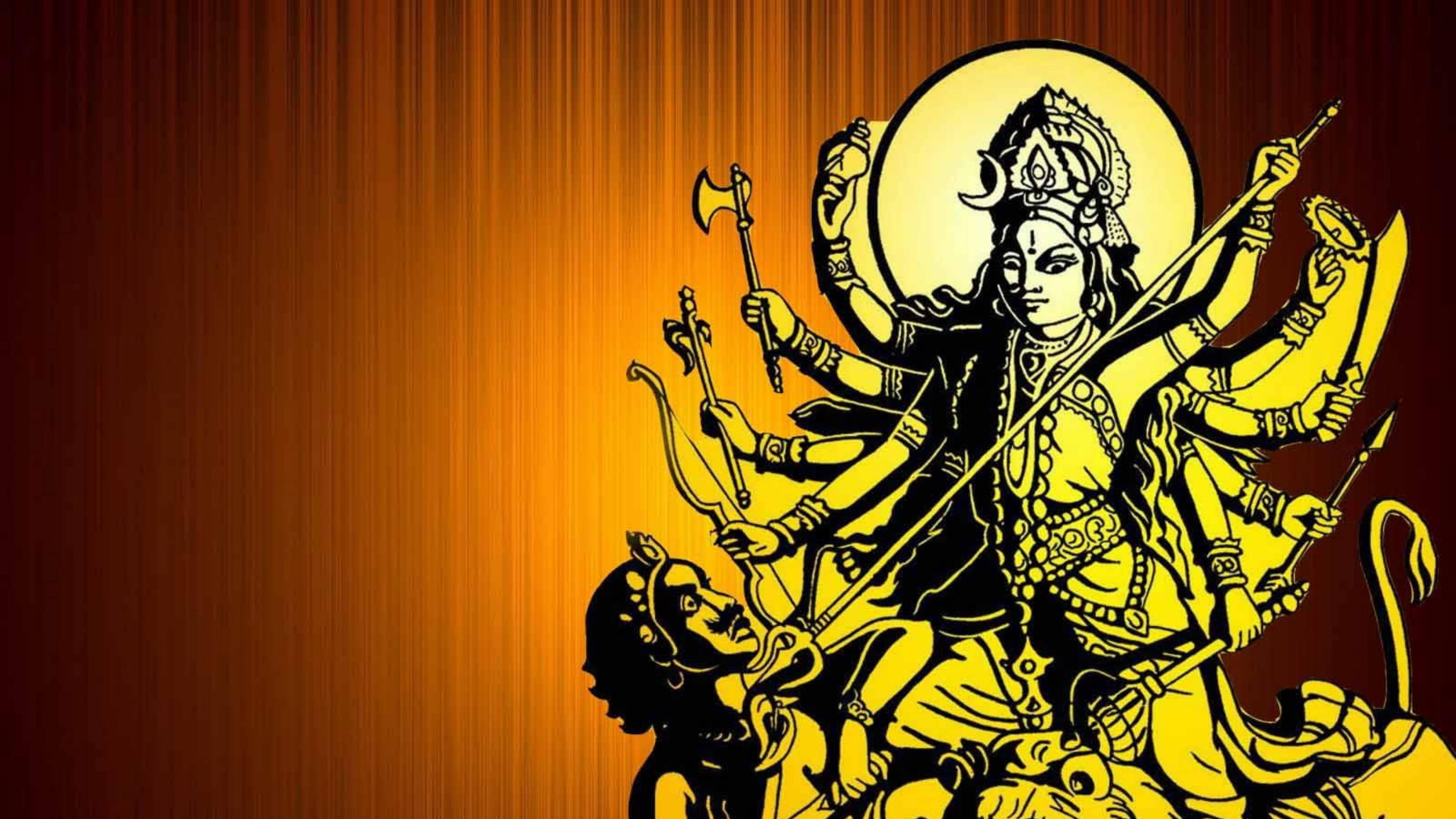 Goddess 桌布 壁紙 — 一幅閃耀金色的插圖，描繪多臂印度教女神杜爾迦騎著獅子，在深橙色漸變背景上揮舞武器。