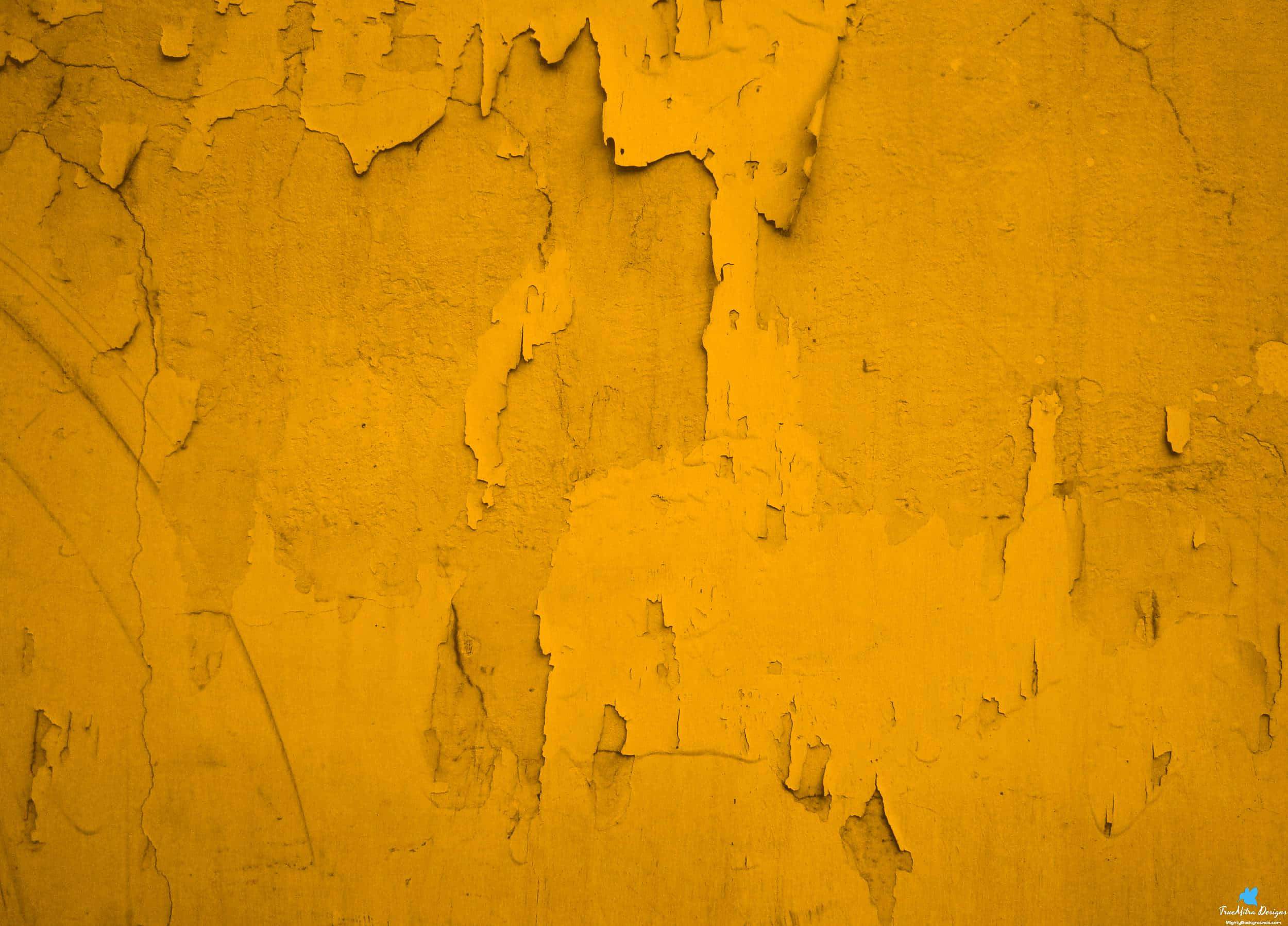 Yellow Grunge 桌布 壁紙 — 一幅風化黃色牆壁的特寫，剝落的油漆露出底下有紋理的層次。