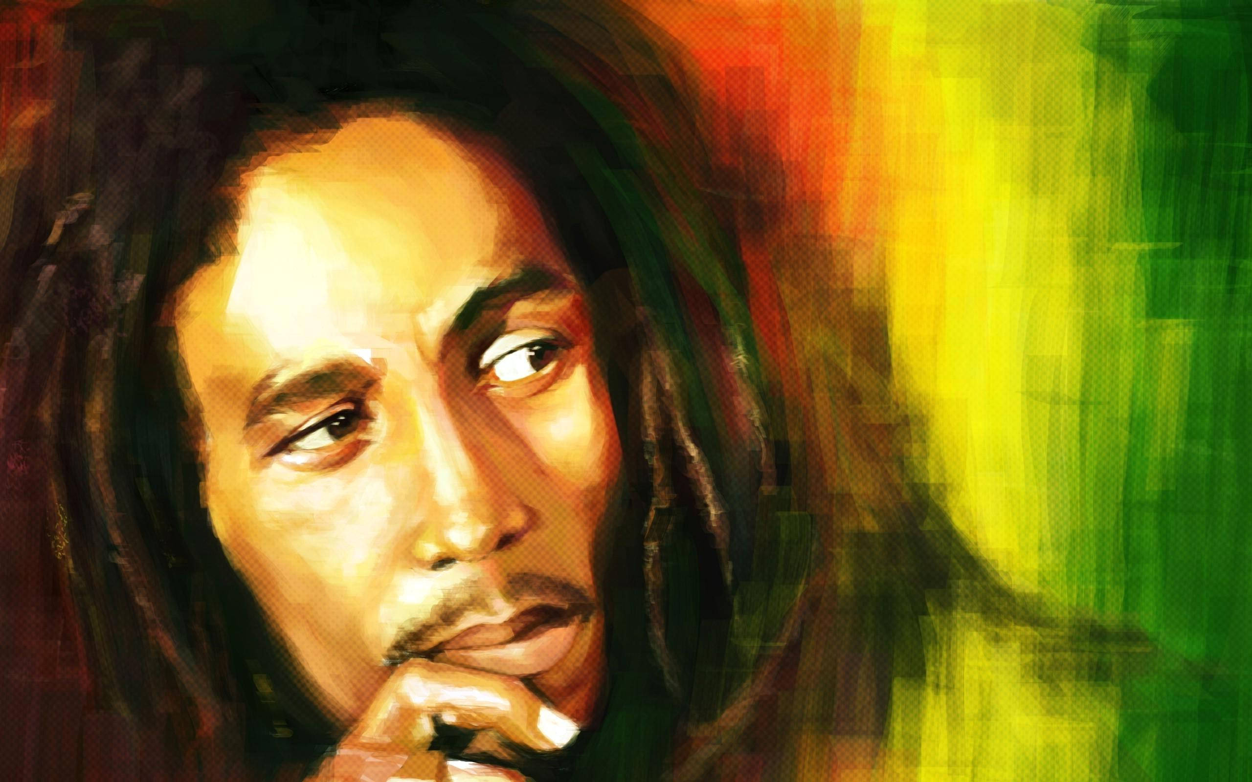 Jamaica 桌布 壁紙 — 一幅風格化的 Bob Marley 肖像，帶有充滿活力的紅、黃、綠色背景，散發能量和雷鬼精神。