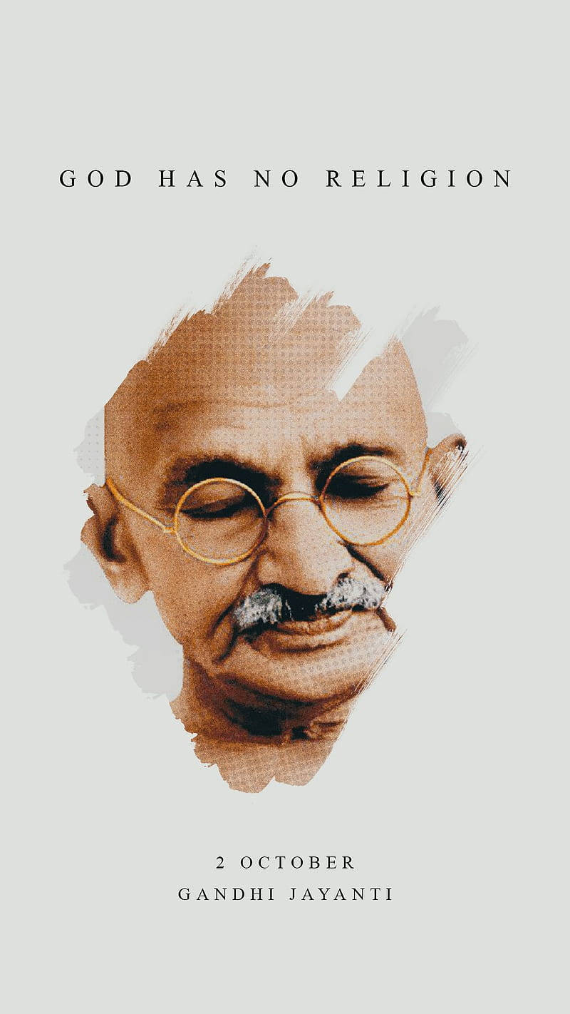 Mahatma Gandhi 桌布 壁紙 — 一幅風格化的聖雄甘地肖像，閉著眼睛，上方文字為「神沒有宗教」，下方文字為「10月2日甘地誕辰」。