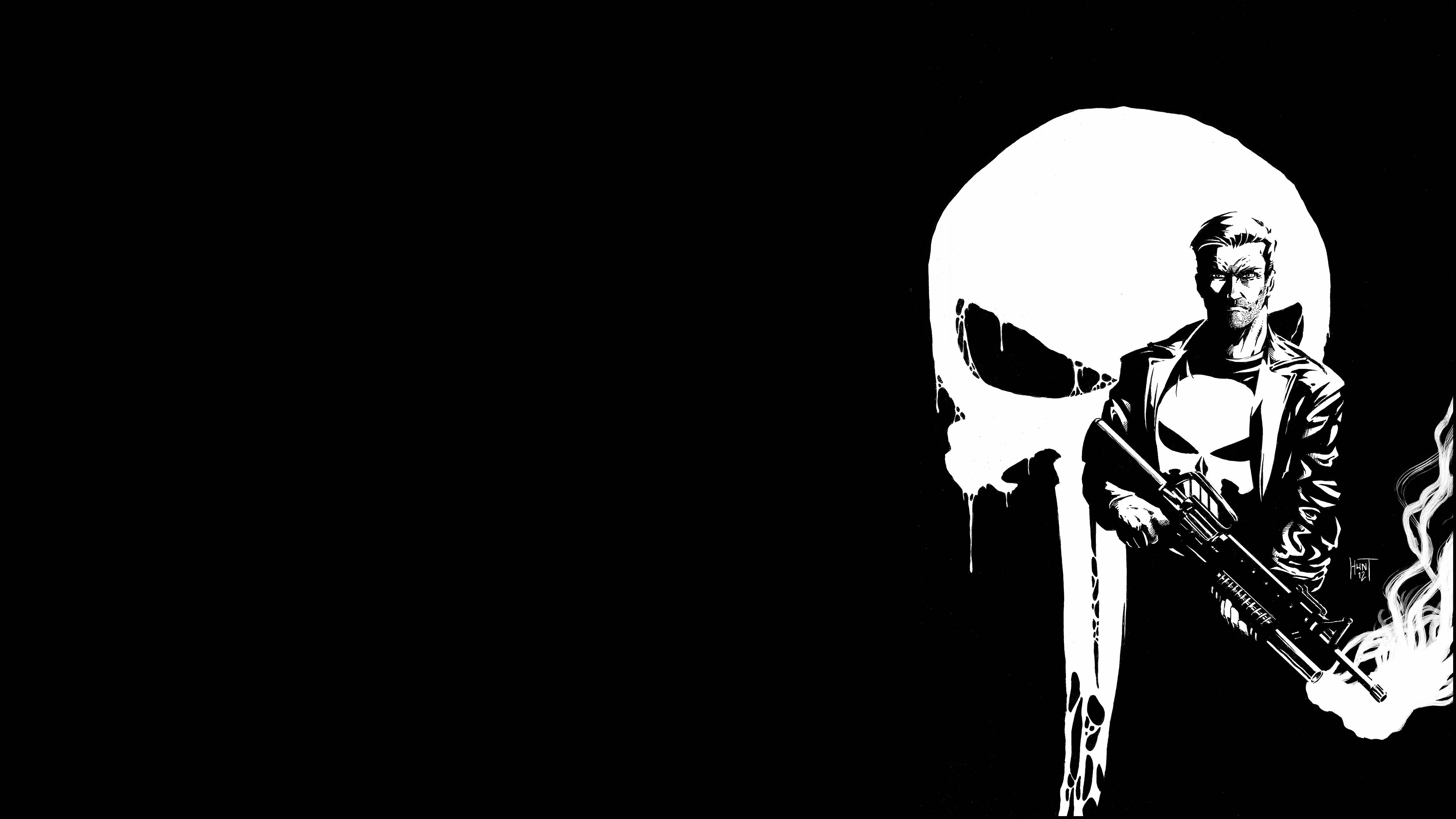 Punisher Logo 桌布 壁紙 — 一幅鮮明的黑白插圖，懲罰者手持冒煙的槍，背景是一個大骷髏頭。
