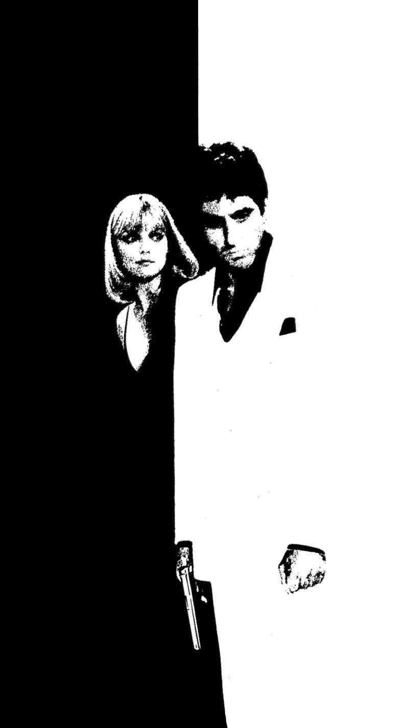 Al Pacino Scarface 桌布 壁紙 — 一幅鮮明的黑白插圖，描繪一男一女以剪影形式站在分裂的背景前，其中一人手持槍支。