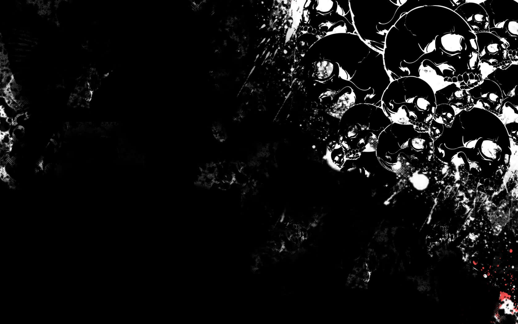skulls 桌布 壁紙 — 一幅鮮明的黑白數位藝術作品，呈現一簇光澤的頭骨從帶有紋理的深色背景中浮現，並帶有白色和紅色的飛濺點綴。