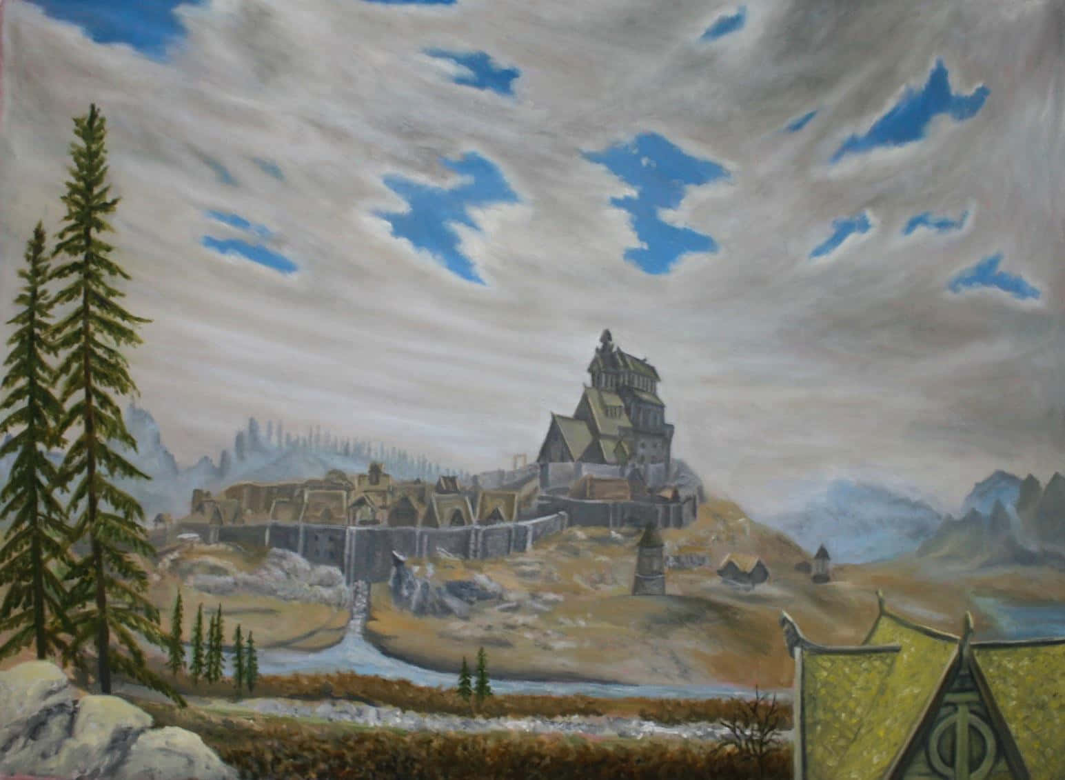 Skyrim Whiterun 桌布 壁紙 — 一座中世紀城堡坐落在山丘上，俯瞰蜿蜒的河流、常綠樹木和遠山，天空多雲。
