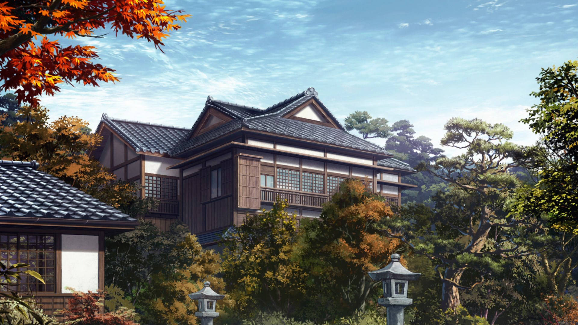 Big House 桌布 壁紙 — 一座傳統日式木屋，瓦片屋頂，坐落在秋日樹木之間，天空清澈湛藍。
