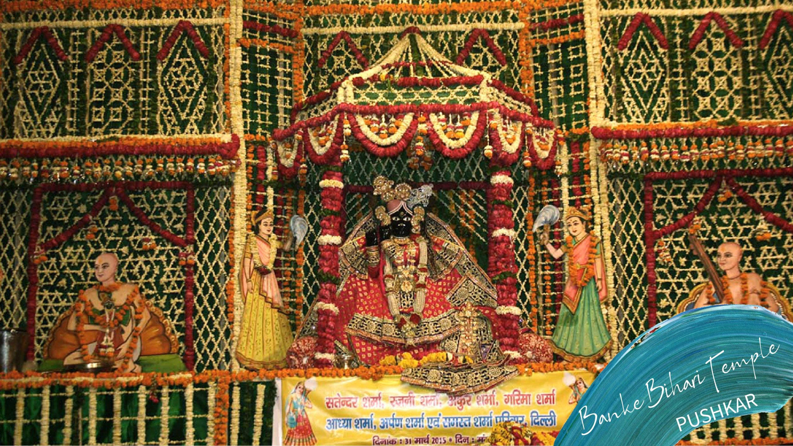 krishna god 桌布 壁紙 — 一座充滿活力的花卉寺廟神龕，裝飾著精緻的紅、黃、綠色花環，中央有神像，周圍是裝飾面板。