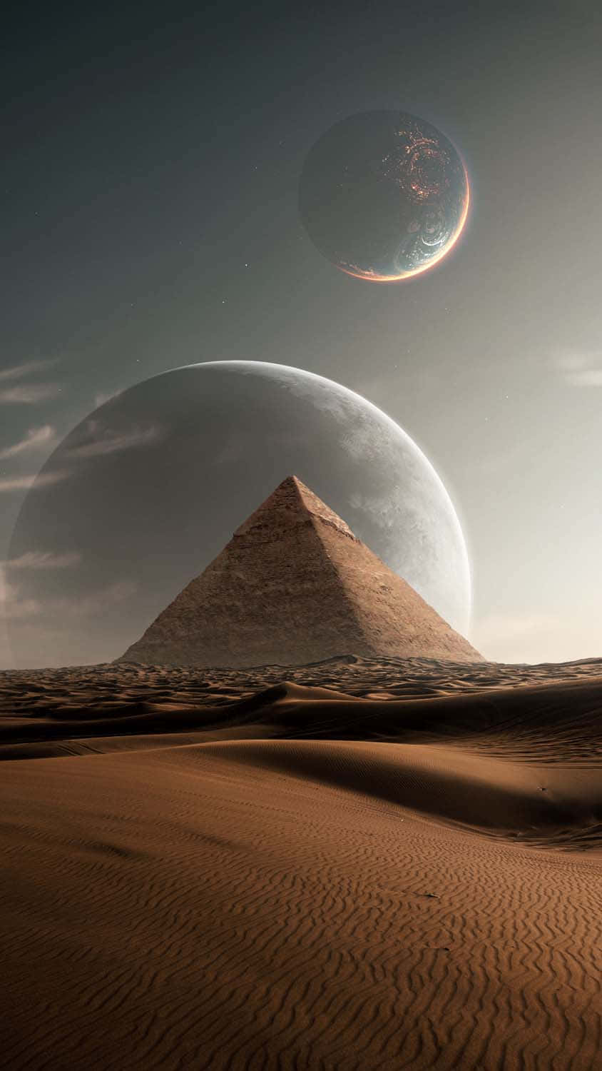 Desert iPhone 桌布 壁紙 — 一座孤獨的金字塔從起伏的沙漠沙丘中升起，在暮色天空下，兩顆發光的行星懸掛天際。