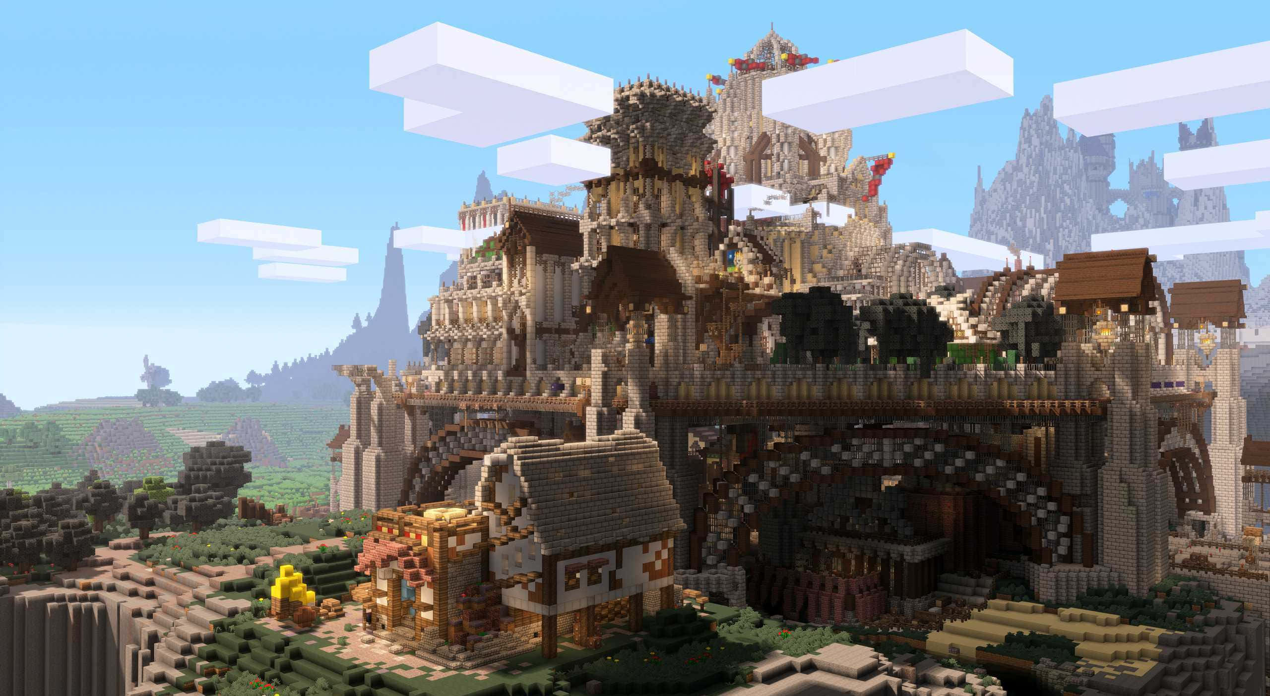 Minecraft City 桌布 壁紙 — 一座宏偉的像素化城堡，擁有浮空島嶼和方塊建築，在晴朗的藍天下矗立在茂密的Minecraft景觀之上。