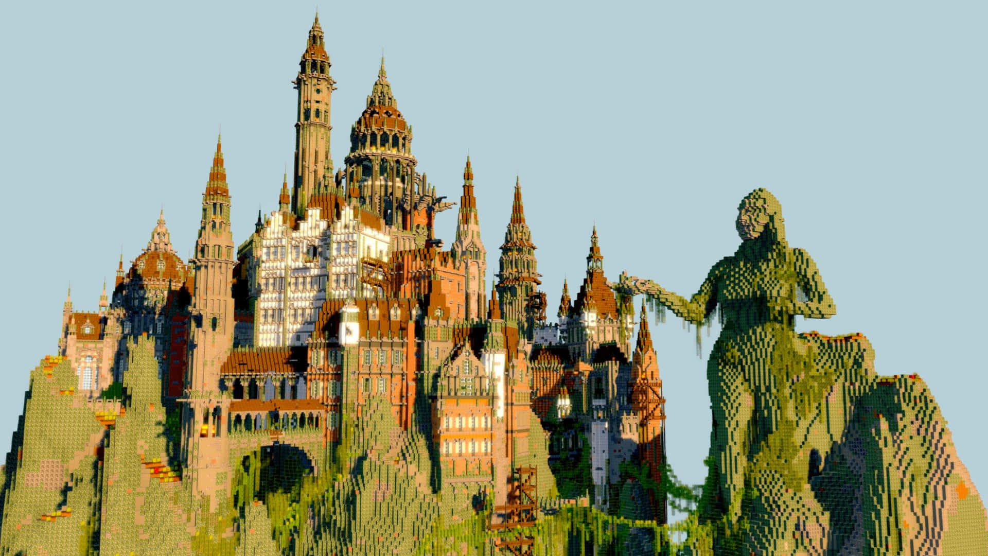 Minecraft Castles 桌布 壁紙 — 一座宏偉的哥德式城堡和一座高聳的雕像，在晴朗的天空下以鮮豔的像素方塊呈現。