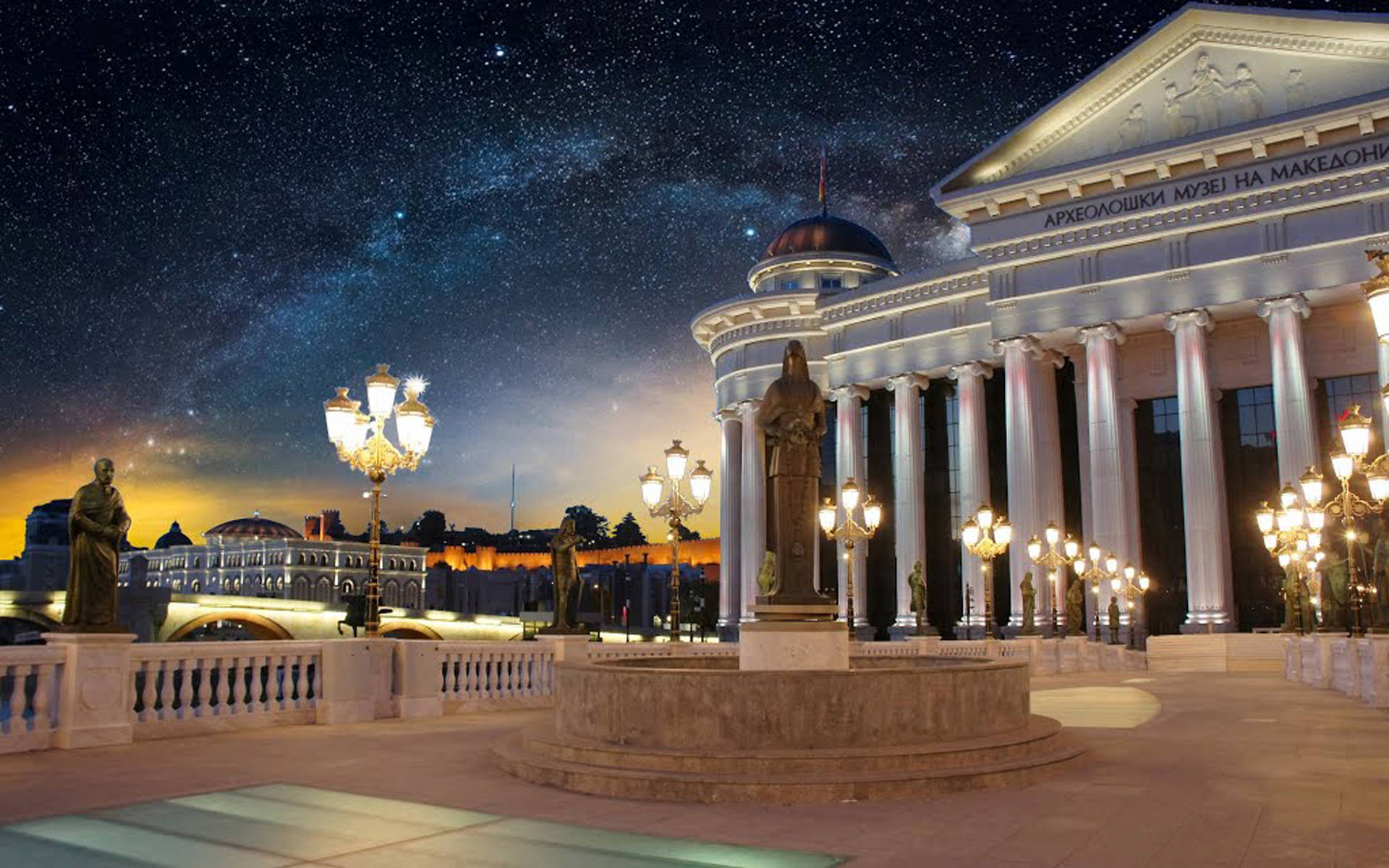 Macedonia 桌布 壁紙 — 一座宏偉的新古典主義博物館在夜晚被照亮，上方是令人嘆為觀止的星空，銀河清晰可見。