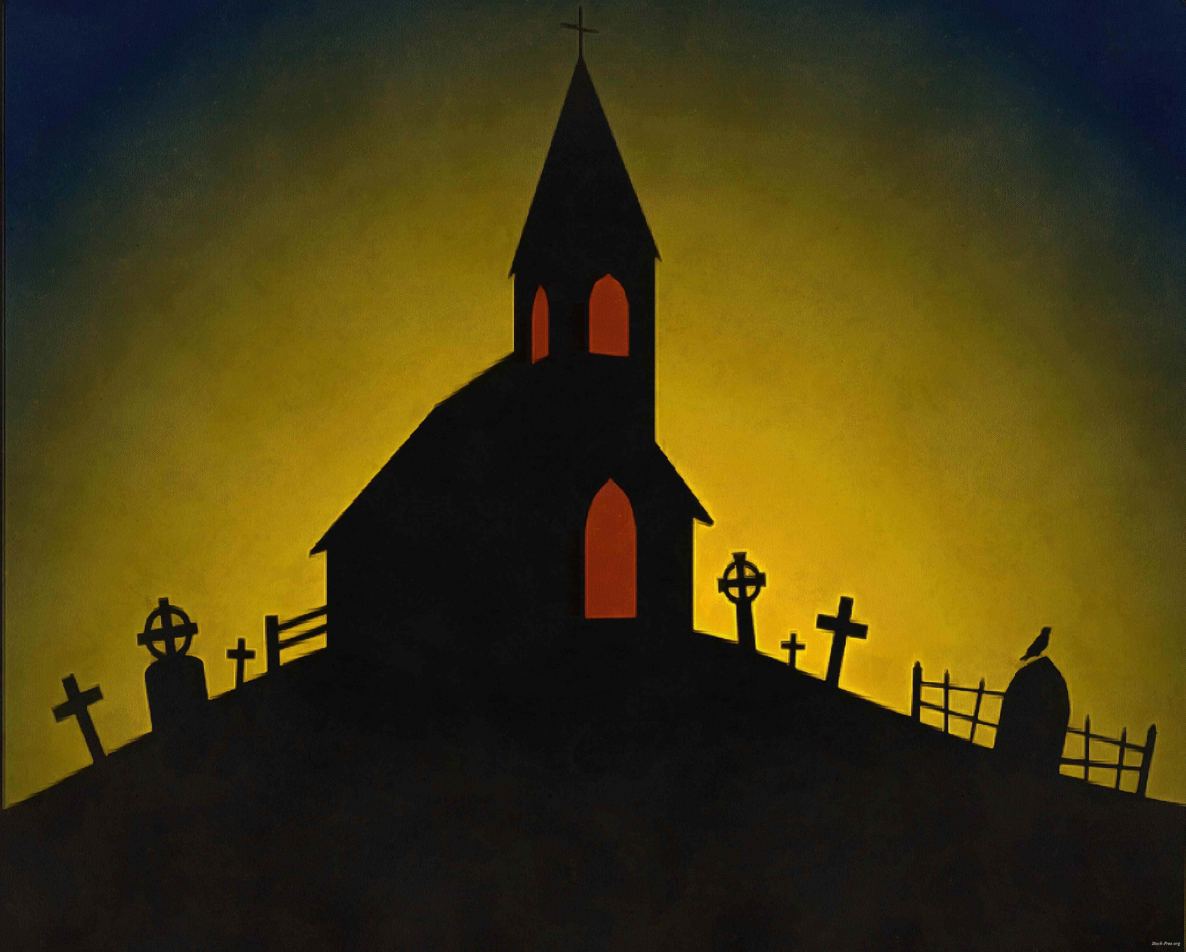 Spooky Halloween 桌布 壁紙 — 一座帶有發光窗戶的教堂的鮮明剪影矗立在山頂上，周圍是墓碑，天空呈現黃藍漸變色。