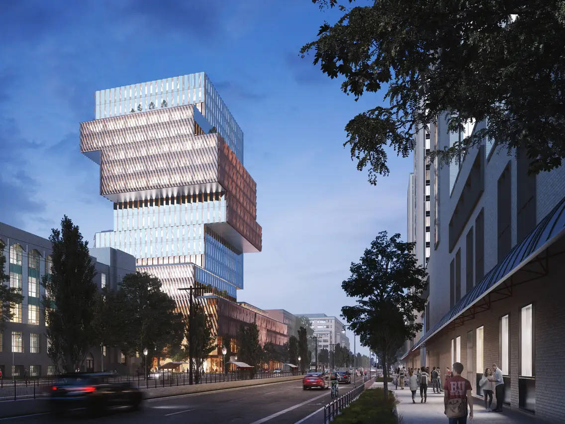 Boston 桌布 壁紙 — 一座現代建築奇蹟，帶有分層玻璃和銅板，在黃昏時分聳立在繁華的城市街道上。