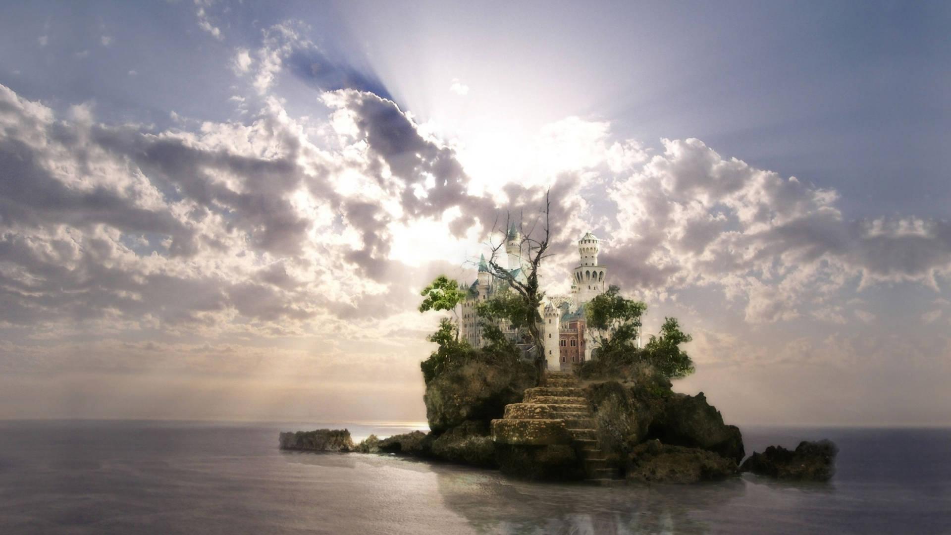 奇幻島 桌布 壁紙 — 一座雄偉的城堡坐落在廣闊海洋中央的岩石島上，天空戲劇性地多雲，陽光穿透雲層。