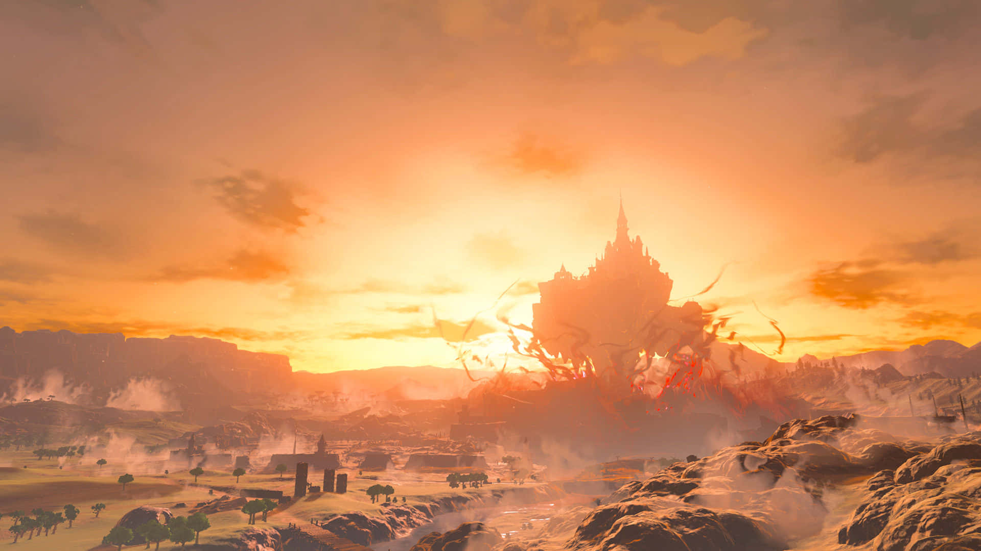 The Legend Of Zelda Tears Of The Kingdom 桌布 壁紙 — 一座雄偉的城堡從日落時分霧氣瀰漫的沙漠中升起，將溫暖的橙色光芒投射在崎嶇的地形和遠處的廢墟上。
