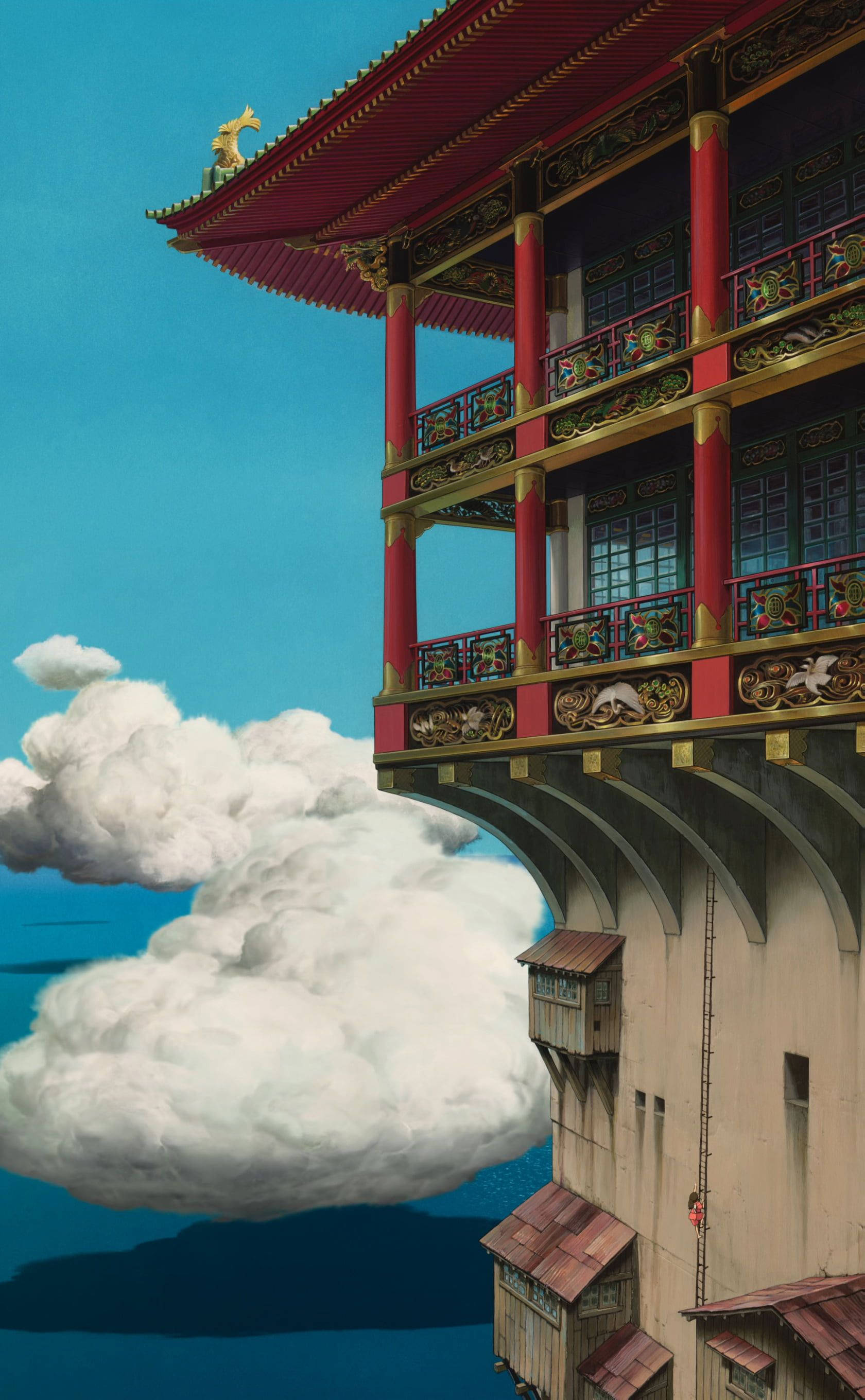 Studio 桌布 壁紙 — 一座雄偉的紅金色寶塔漂浮在蓬鬆的白雲之上，背景是清澈的藍天和遠方的大海。