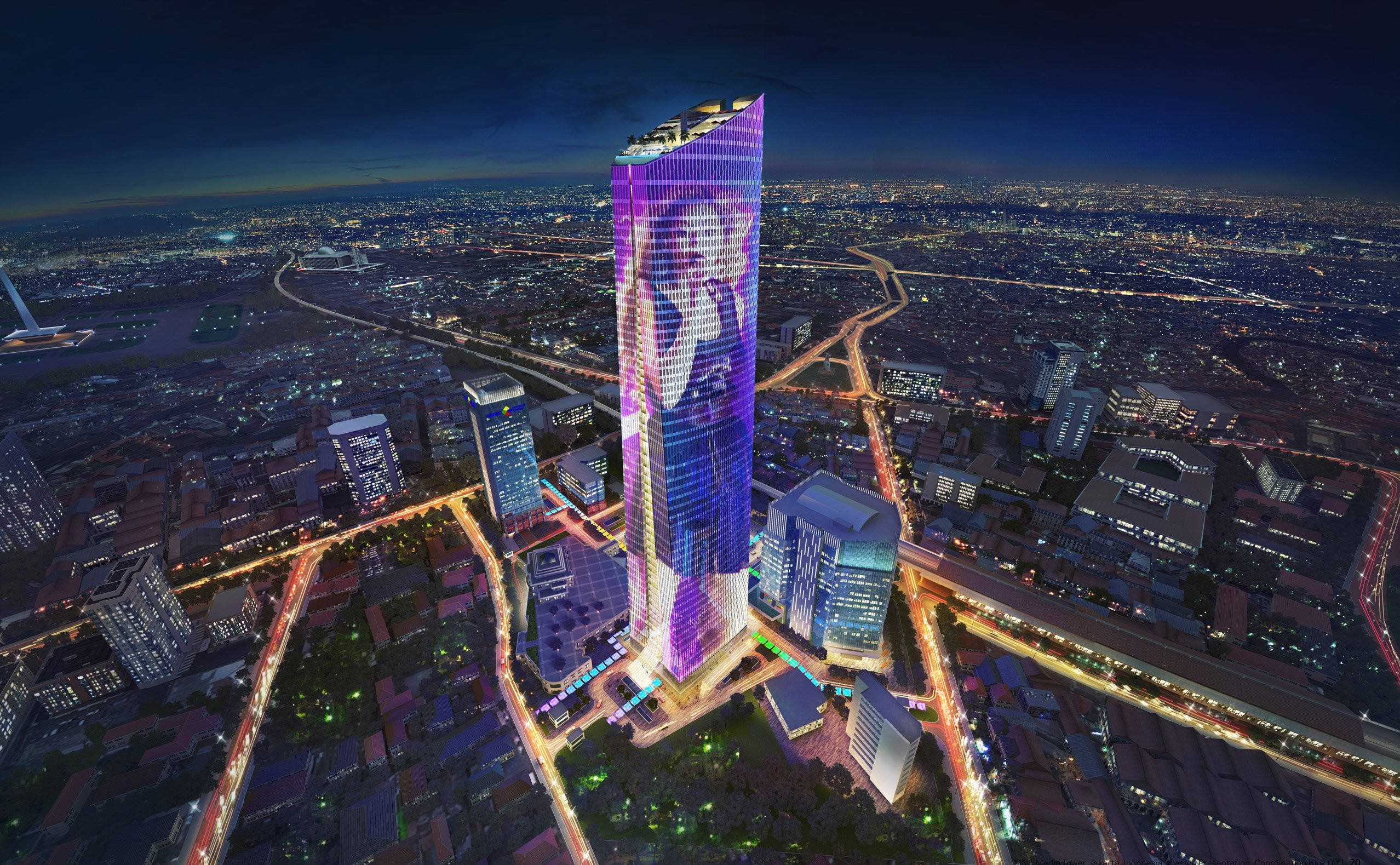 Jakarta 桌布 壁紙 — 一座高聳的摩天大樓在廣闊的城市夜景中散發著鮮豔的紫色光芒。