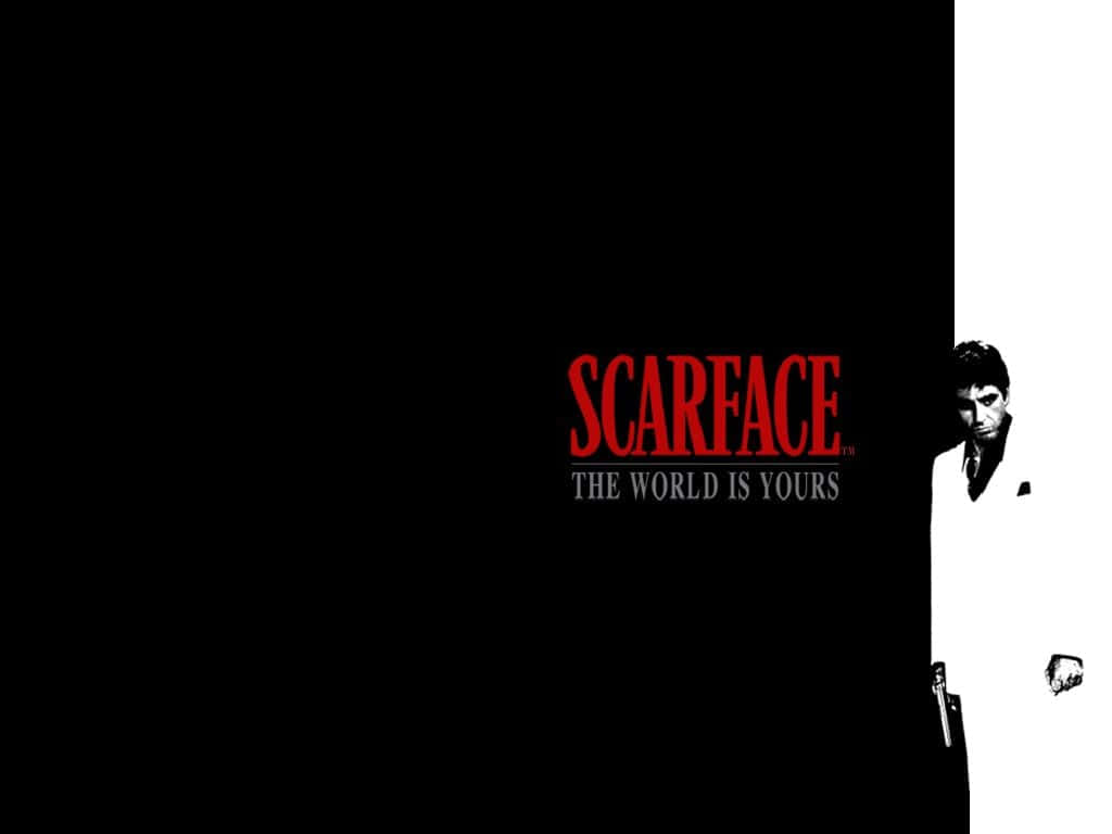 Scarface Desktop 桌布 壁紙 — 一張《疤面煞星》的鮮明黑白海報，右側一名身穿白色西裝的男子持槍窺視。