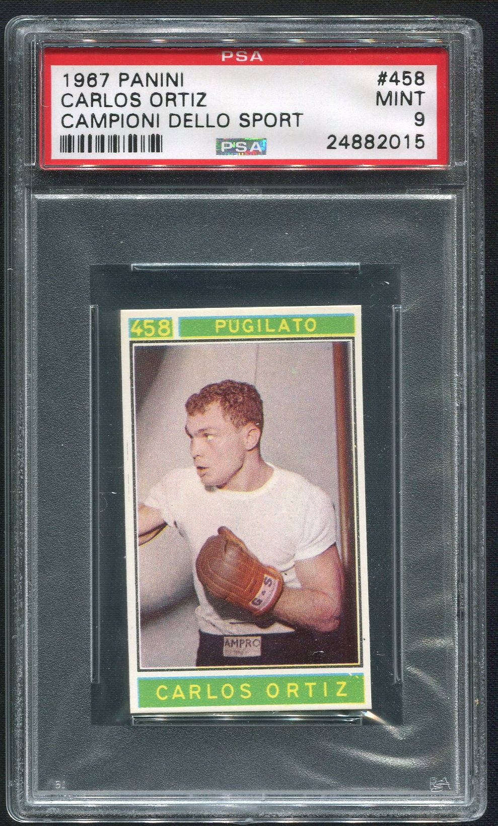Boxing 桌布 壁紙 — 一張1987年Panini拳擊卡，卡洛斯·奧爾蒂斯，PSA評級為Mint 9，封裝在保護套中，帶有醒目的綠色邊框和復古照片。
