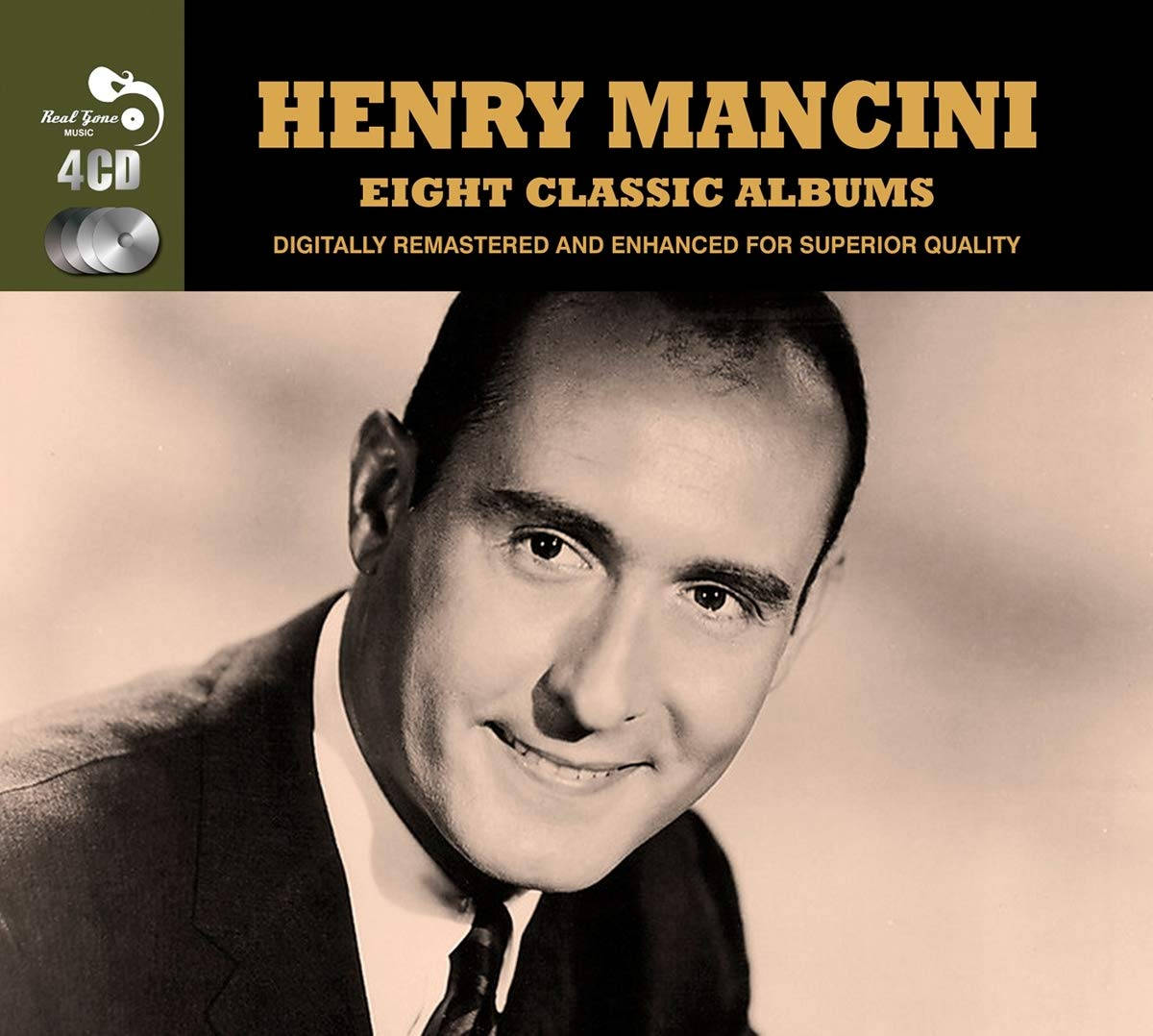 音樂 桌布 壁紙 — 一張亨利·曼西尼（Henry Mancini）穿著西裝，在柔和模糊背景下溫暖微笑的棕褐色調肖像。
