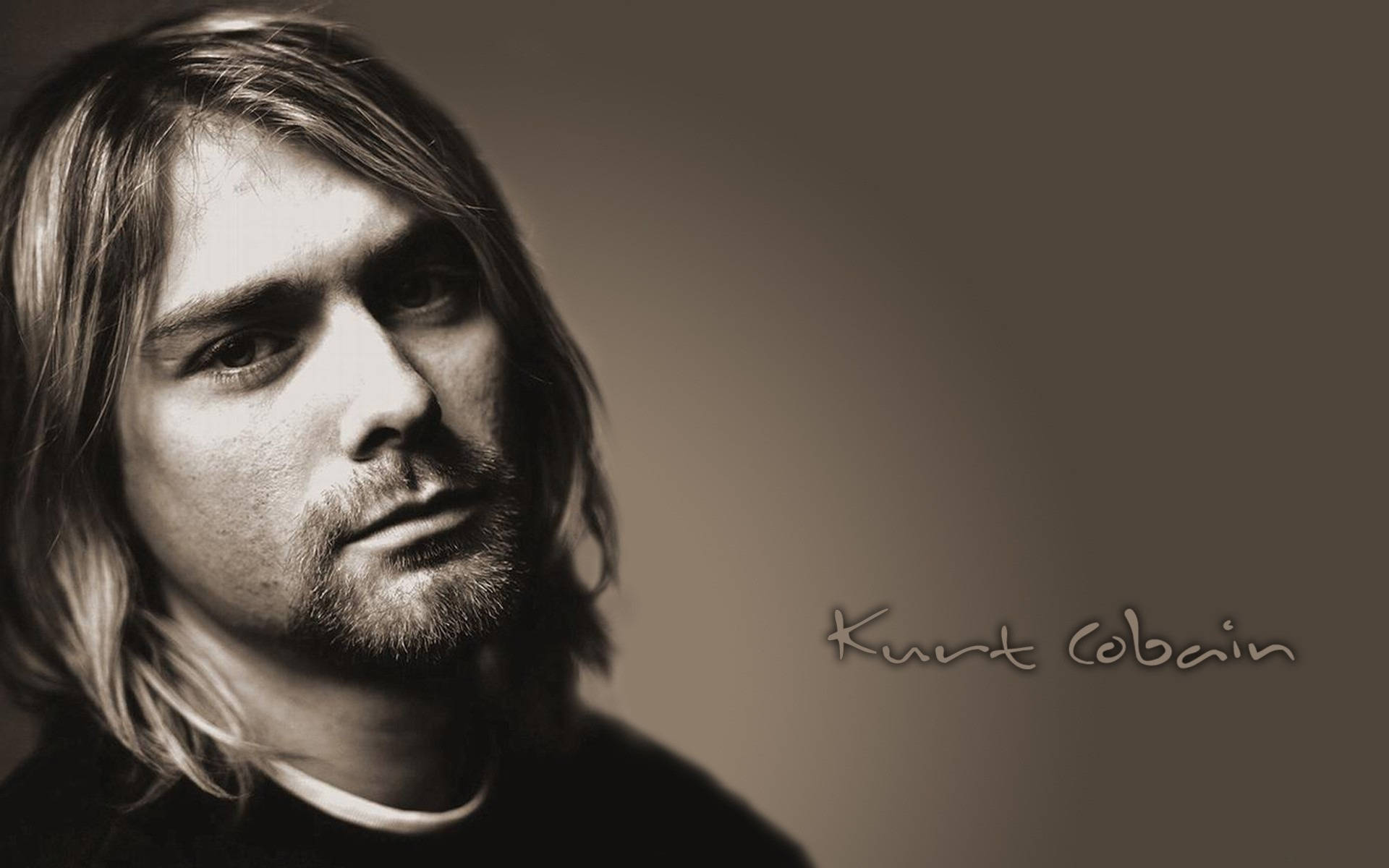 涅槃 桌布 壁紙 — 一張以柔和漸變背景為襯托的科特·柯本（Kurt Cobain）棕褐色調肖像，長髮飄逸，神情沉思。