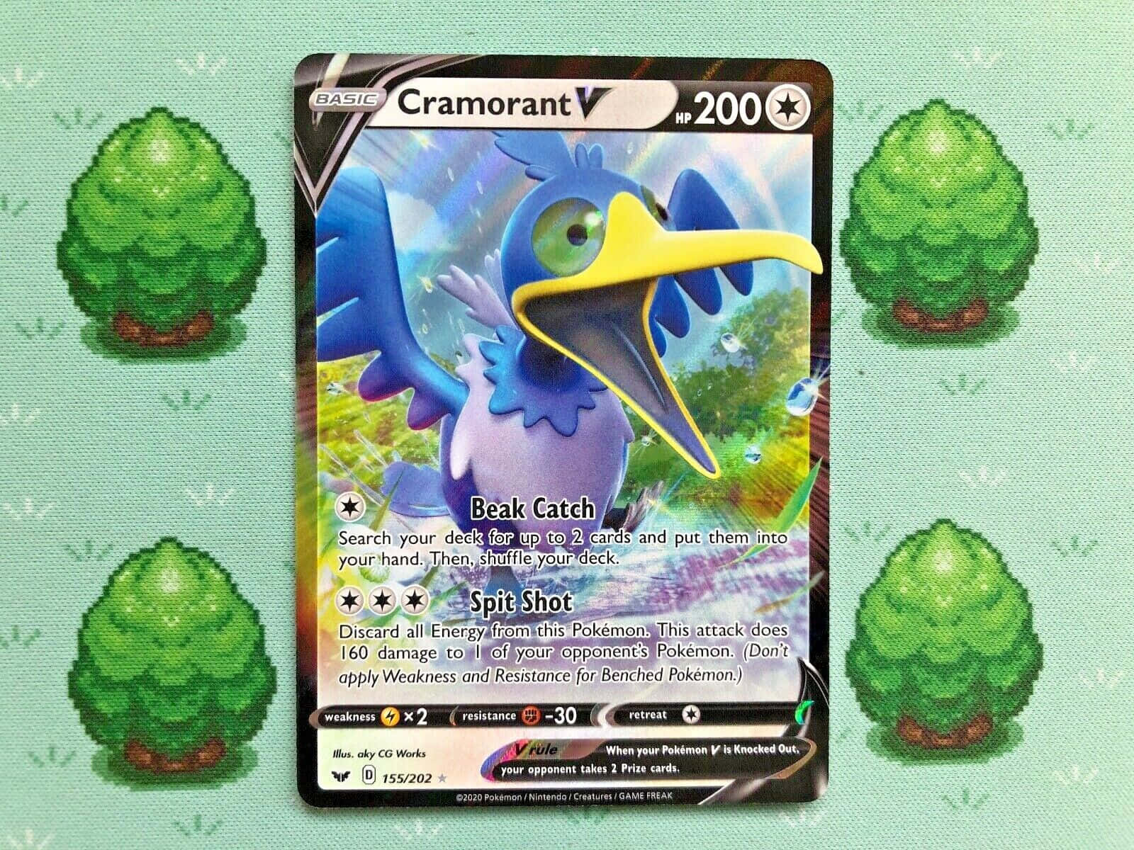 寶可夢 桌布 壁紙 — 一張像素化的Cramorant V Pokémon卡，居中於淺綠色像素桌布上，帶有四棵像素樹。