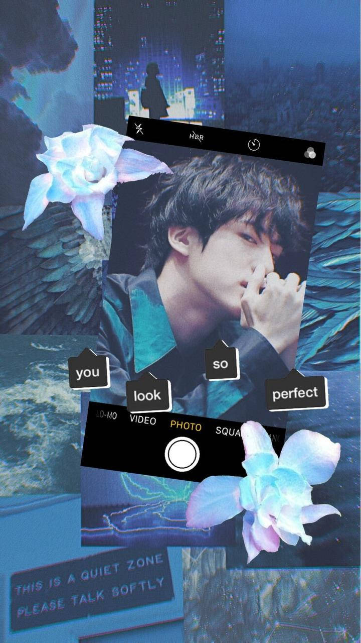 Collage 桌布 壁紙 — 一張充滿氛圍的拼貼畫， featuring 一位黑髮年輕男子、發光的藍色花朵，以及夜晚的城市天際線，並帶有 'you look so perfect' 疊加文字。