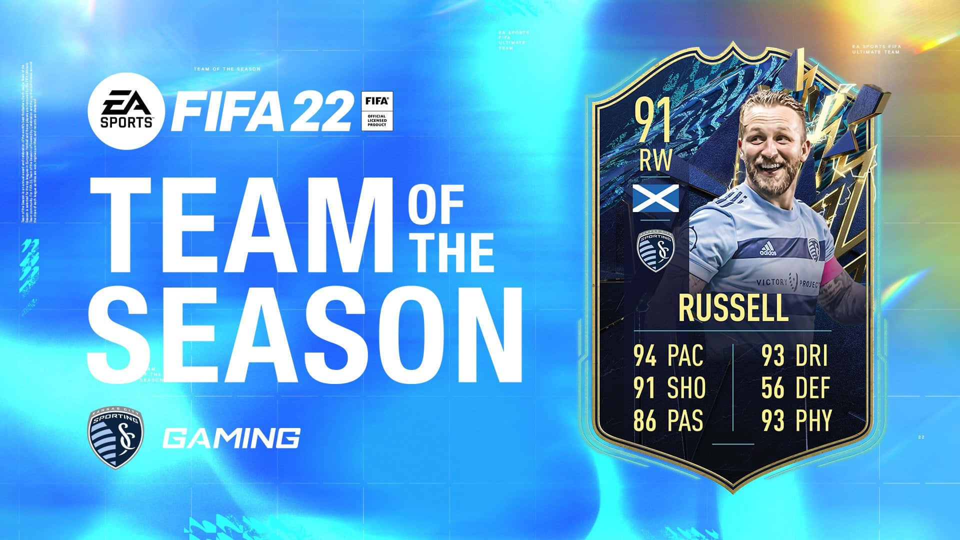足球 桌布 壁紙 — 一張充滿活力的FIFA 22遊戲卡， featuring 球員Russell，附有統計數據和蘇格蘭國旗，背景為發光的藍色抽象圖案。