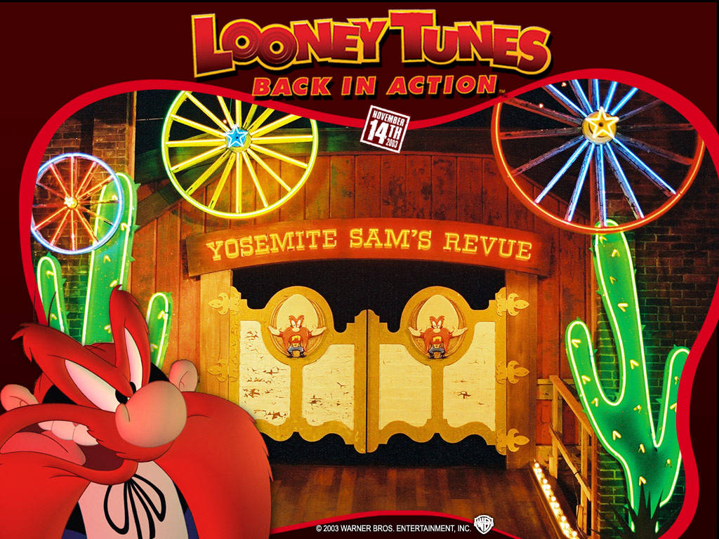 Yosemite Sam 桌布 壁紙 — 一張充滿活力的Looney Tunes海報，描繪了Yosemite Sam在一個霓虹燈照亮的西部歌舞表演舞台前，背景有發光的仙人掌和馬車輪。