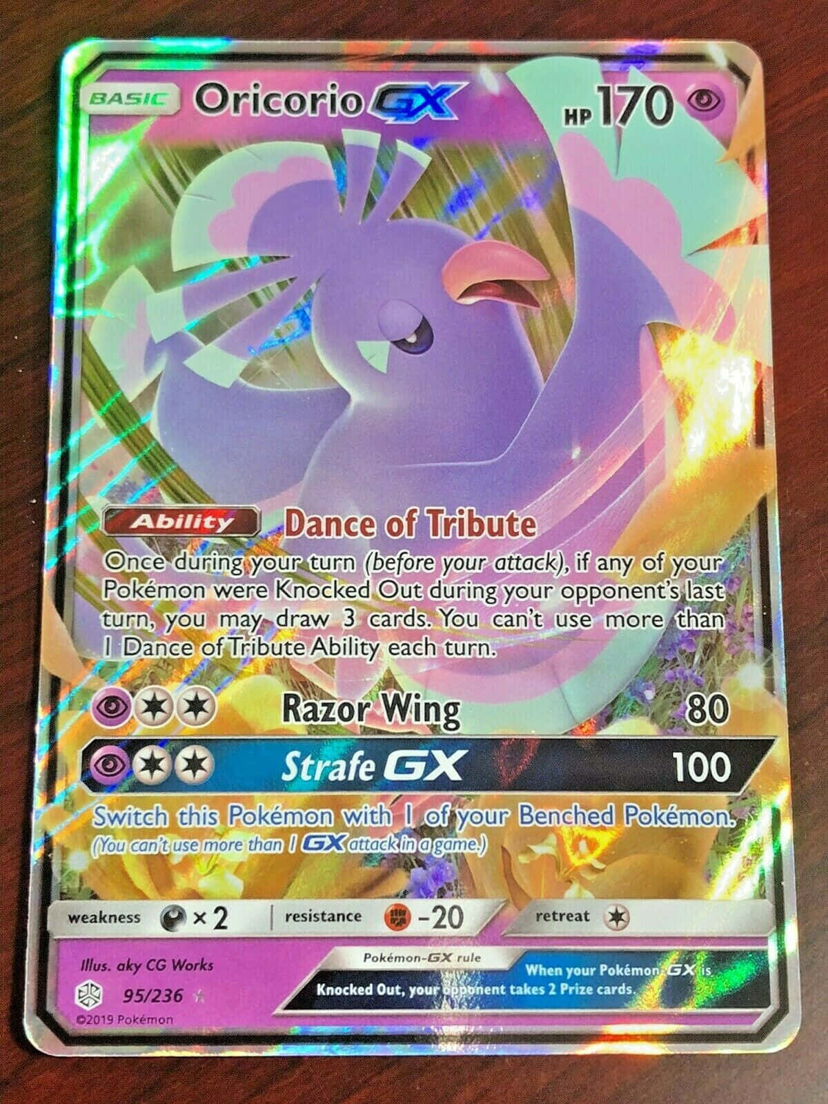 寶可夢 桌布 壁紙 — 一張全息寶可夢卡牌， featuring 紫色 Oricorio GX，帶有發光的彩虹箔效果和火焰背景藝術。