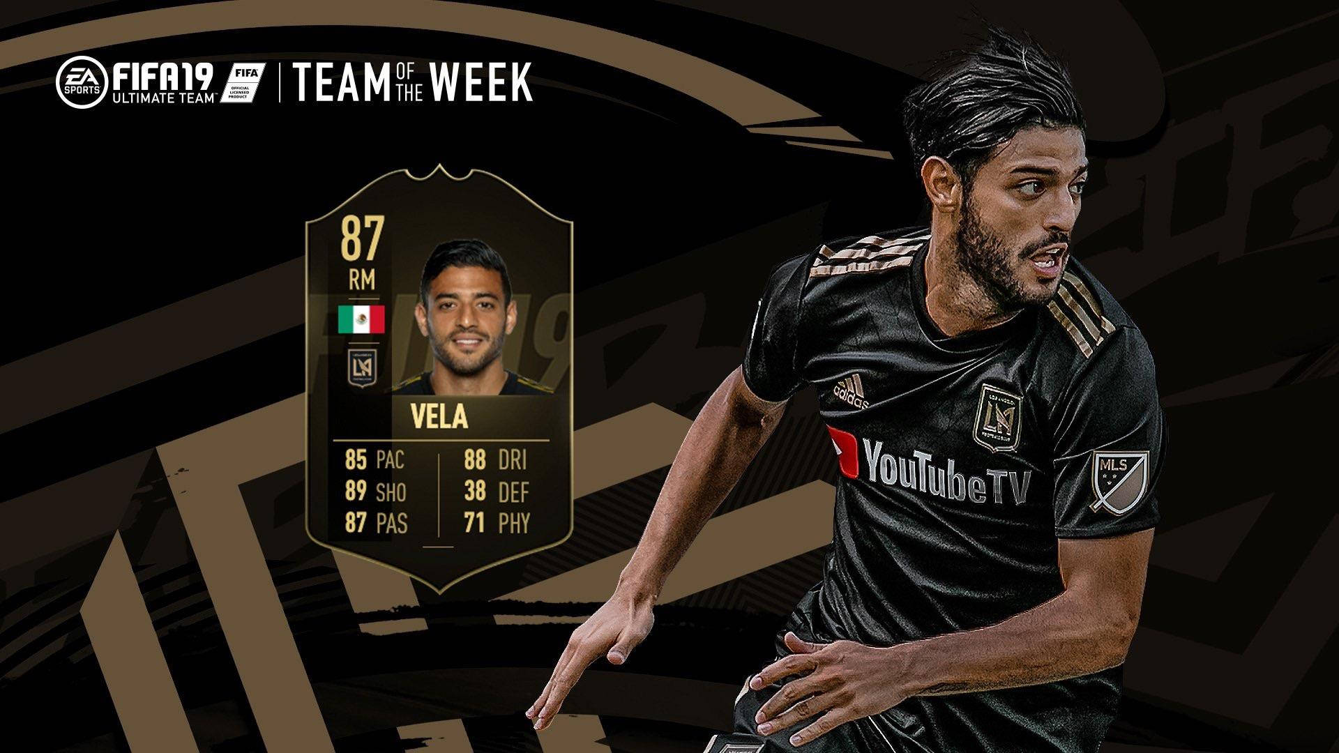足球 桌布 壁紙 — 一張動態的FIFA 19 Ultimate Team球員卡， featuring 足球明星維拉穿著黑色球衣，背景為深色抽象圖案。