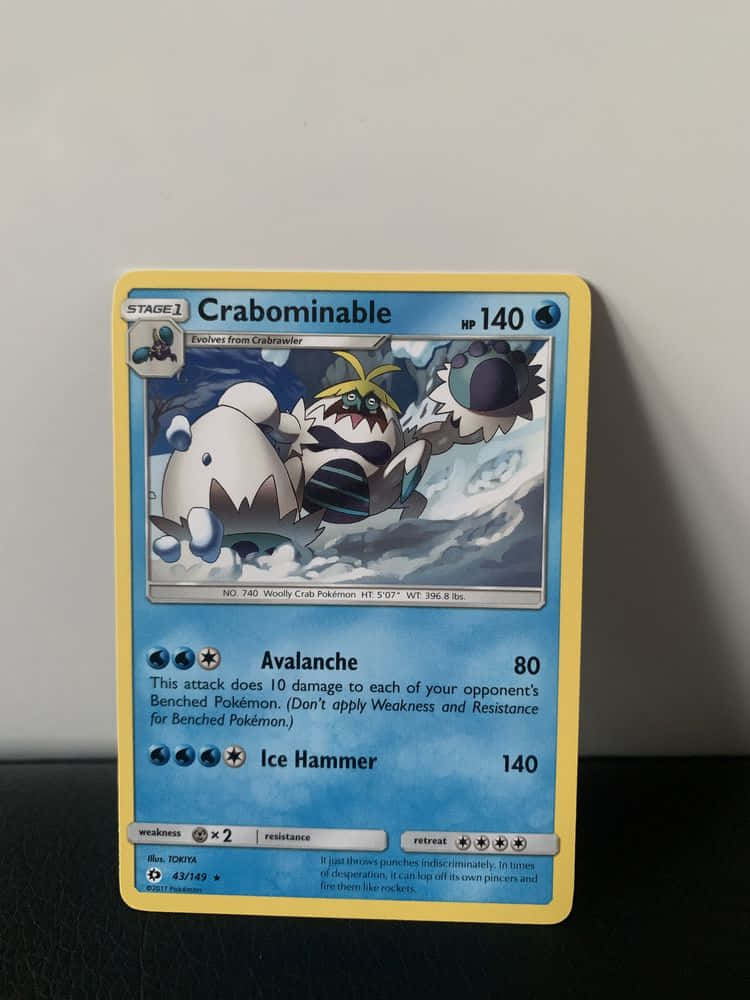 寶可夢 桌布 壁紙 — 一張寶可夢交換卡， featuring Crabominable 在雪地戰鬥場景中，帶有冰效果和攻擊文字。