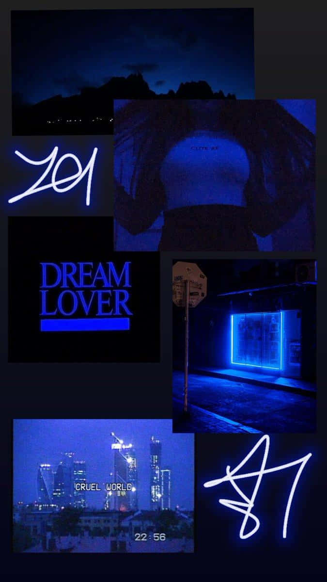 Blue Led 桌布 壁紙 — 一張帶有憂鬱藍色調的拼貼畫，以霓虹燈牌 dream lover 和 cruel world 為特色，背景為黑暗的城市和山脈。