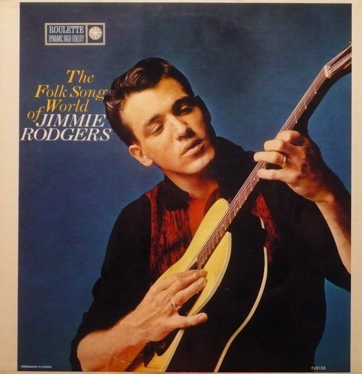 guitar player 桌布 壁紙 — 一張復古專輯封面肖像，Jimmie Rodgers 在深藍色攝影棚背景前手持曼陀林。