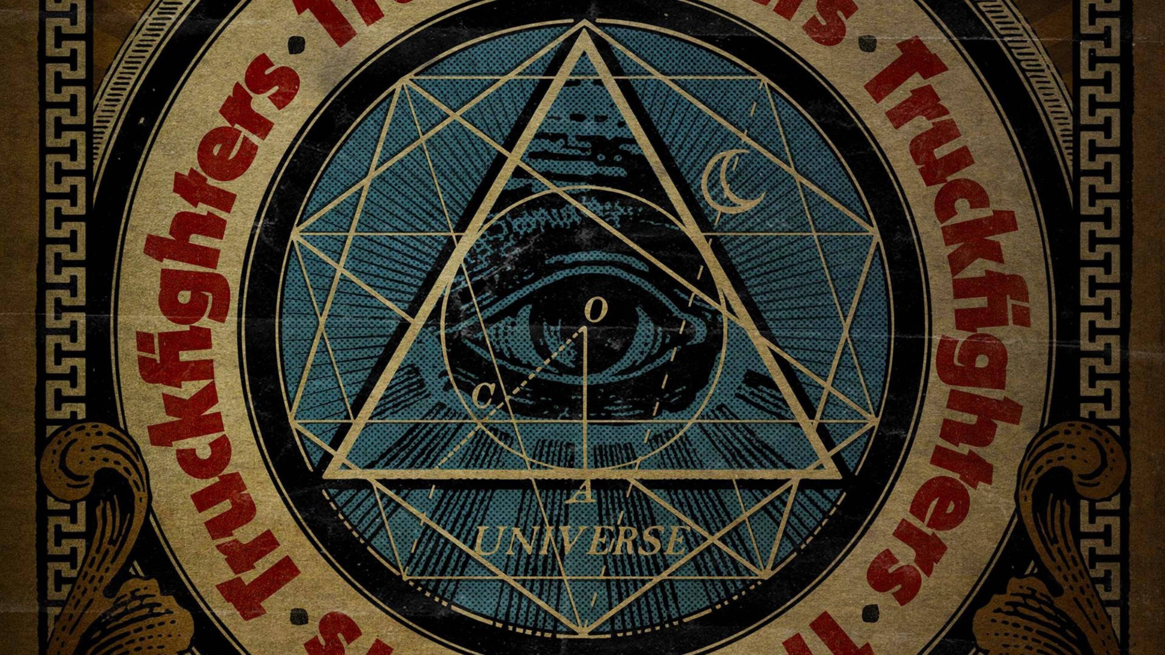 illuminati 桌布 壁紙 — 一張復古海報，三角形和圓形內有一個全視之眼，周圍環繞幾何圖案和「Truckfighters」字樣。
