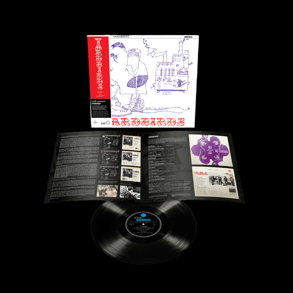 Vinyl Record 桌布 壁紙 — 一張復古的 Yardbirds 黑膠唱片，帶有打開的內套和專輯封面，在純黑背景上呈現藍色線條畫和紅色字體。