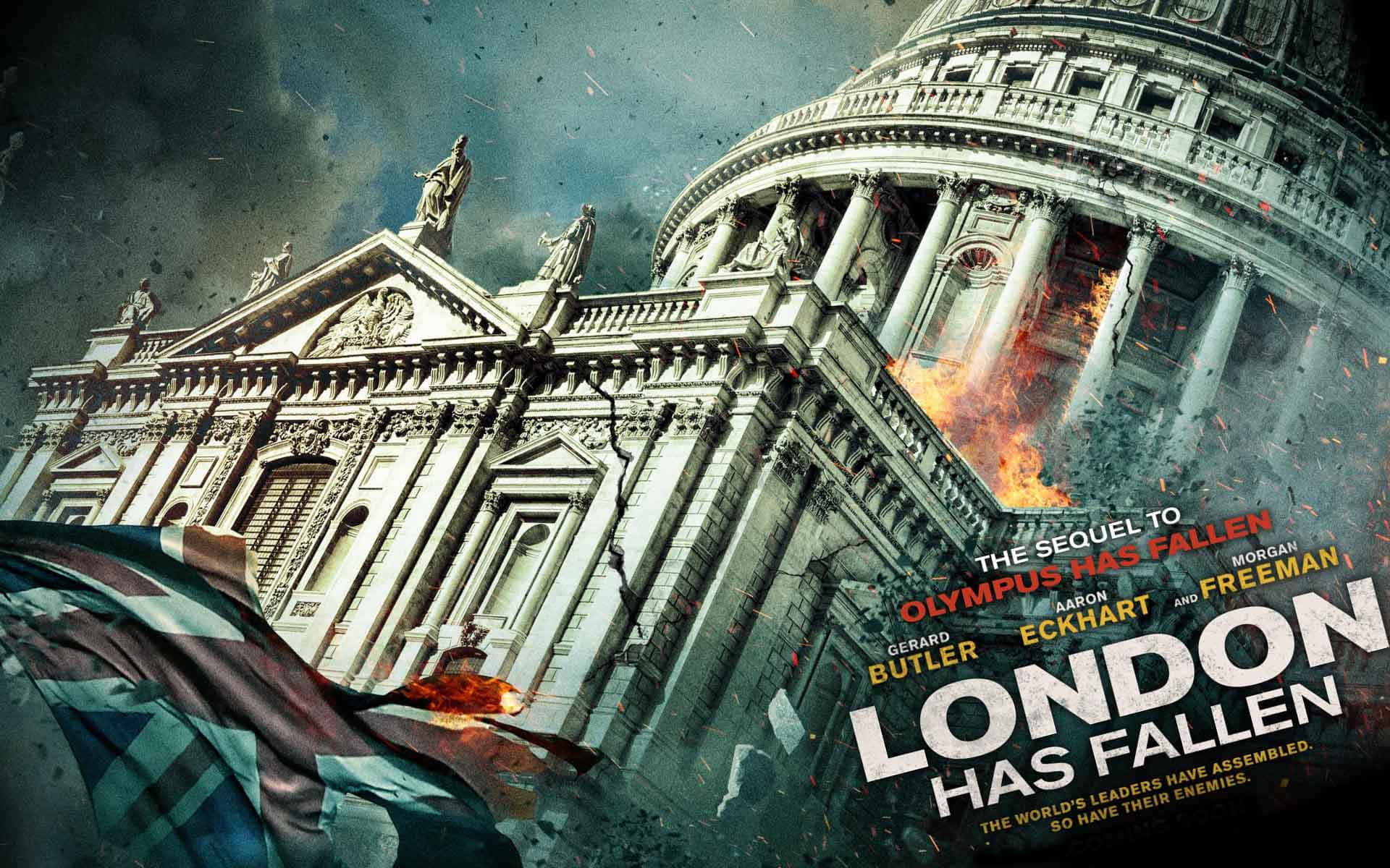 Movie Poster 桌布 壁紙 — 一張戲劇性的電影海報顯示一座燃燒的古典建築，前景有旗幟，文字宣佈倫敦已陷落。