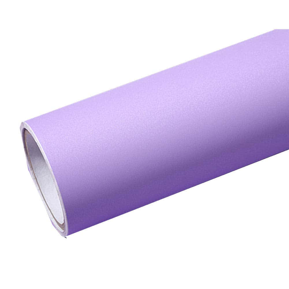 Light Purple Solid 桌布 壁紙 — 一張捲起的啞光薰衣草色壁紙，帶有細微紋理，襯托在潔白背景上。