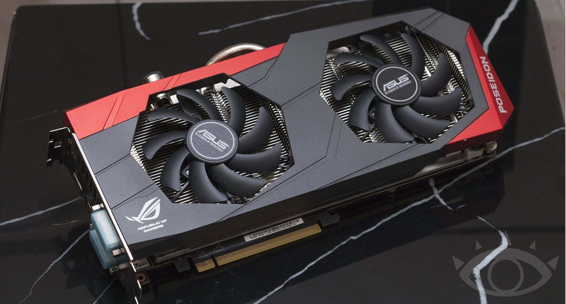4K Graphics Cards 桌布 壁紙 — 一張時尚的黑色和紅色ASUS ROG Strix雙風扇顯示卡放置在光滑的黑色大理石表面上。