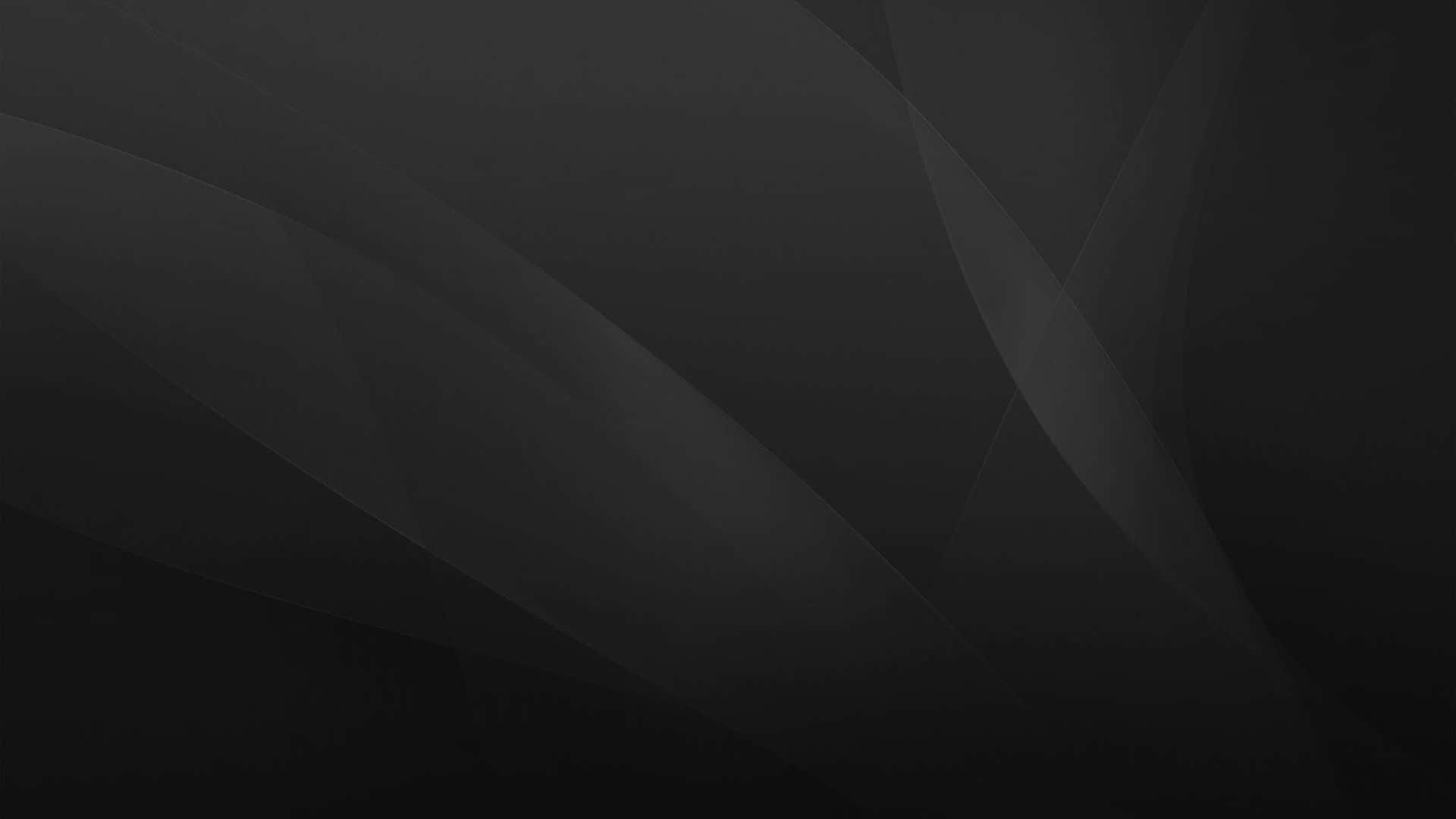 Dark Grey 桌布 壁紙 — 一張極簡抽象風格的壁紙，黑色背景上有流動的深灰色漸變和柔和的光線條紋。